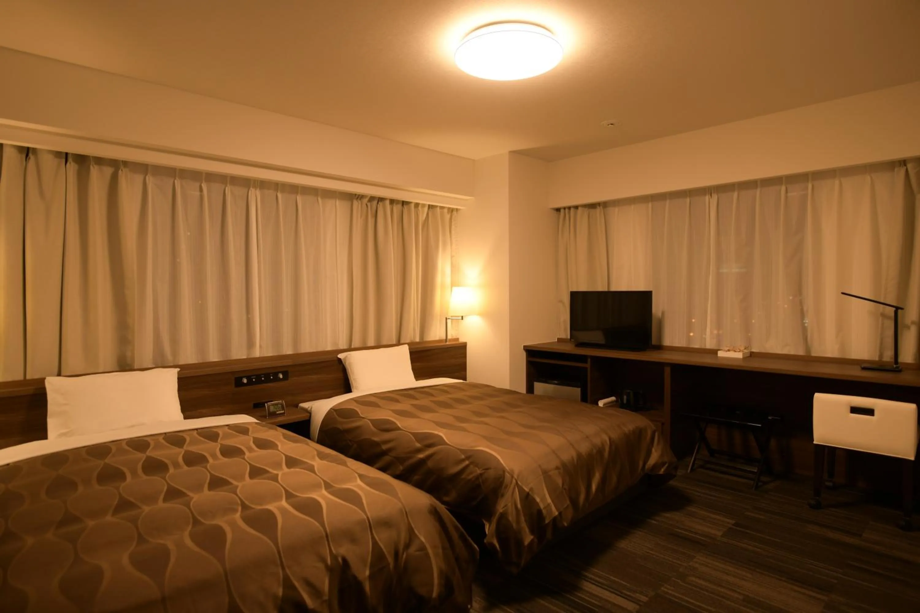 Photo of the whole room, Bed in Sakura Hotel Onomichi Ekimae