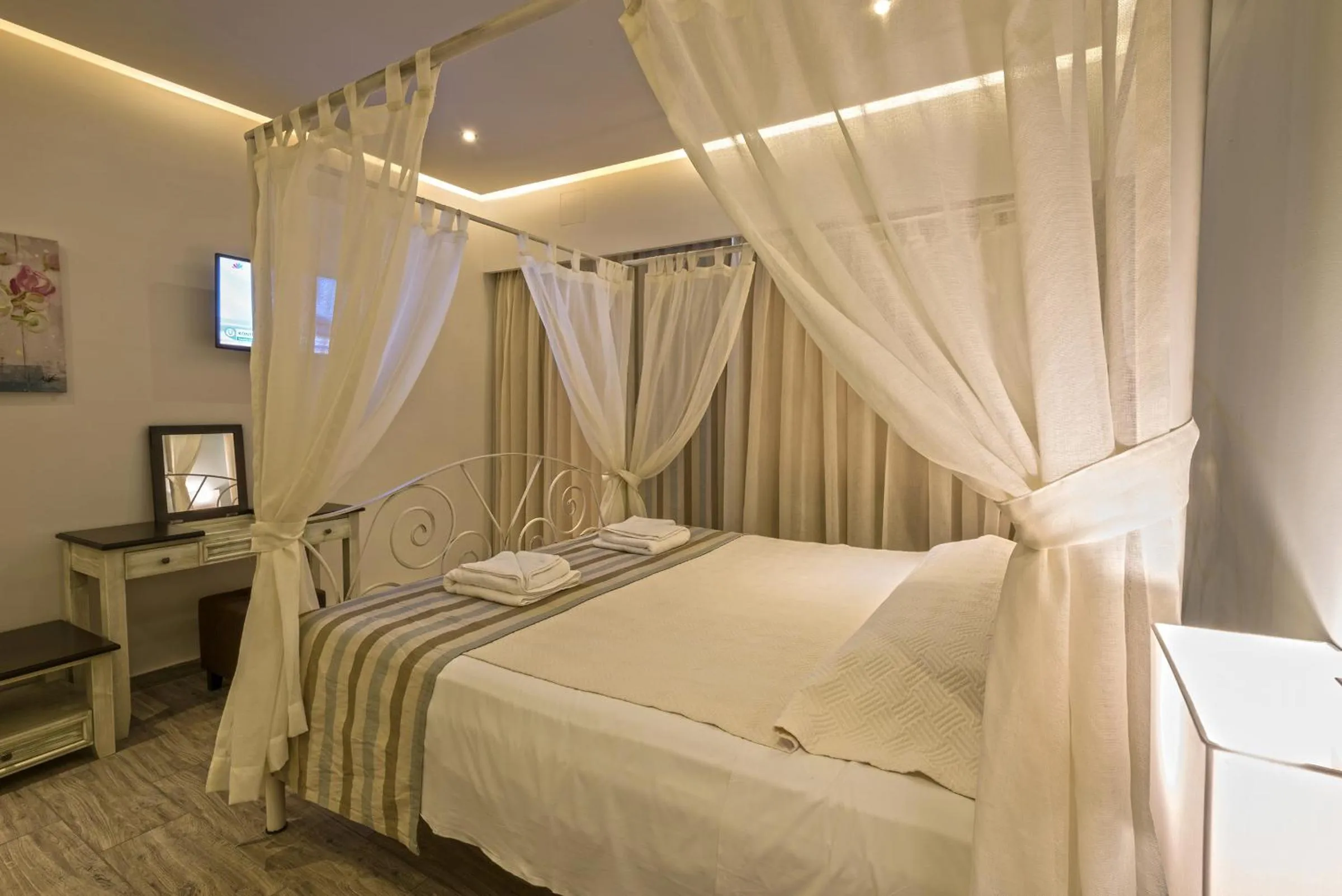 Bed in Princess Irini Sea Front ApartHotel