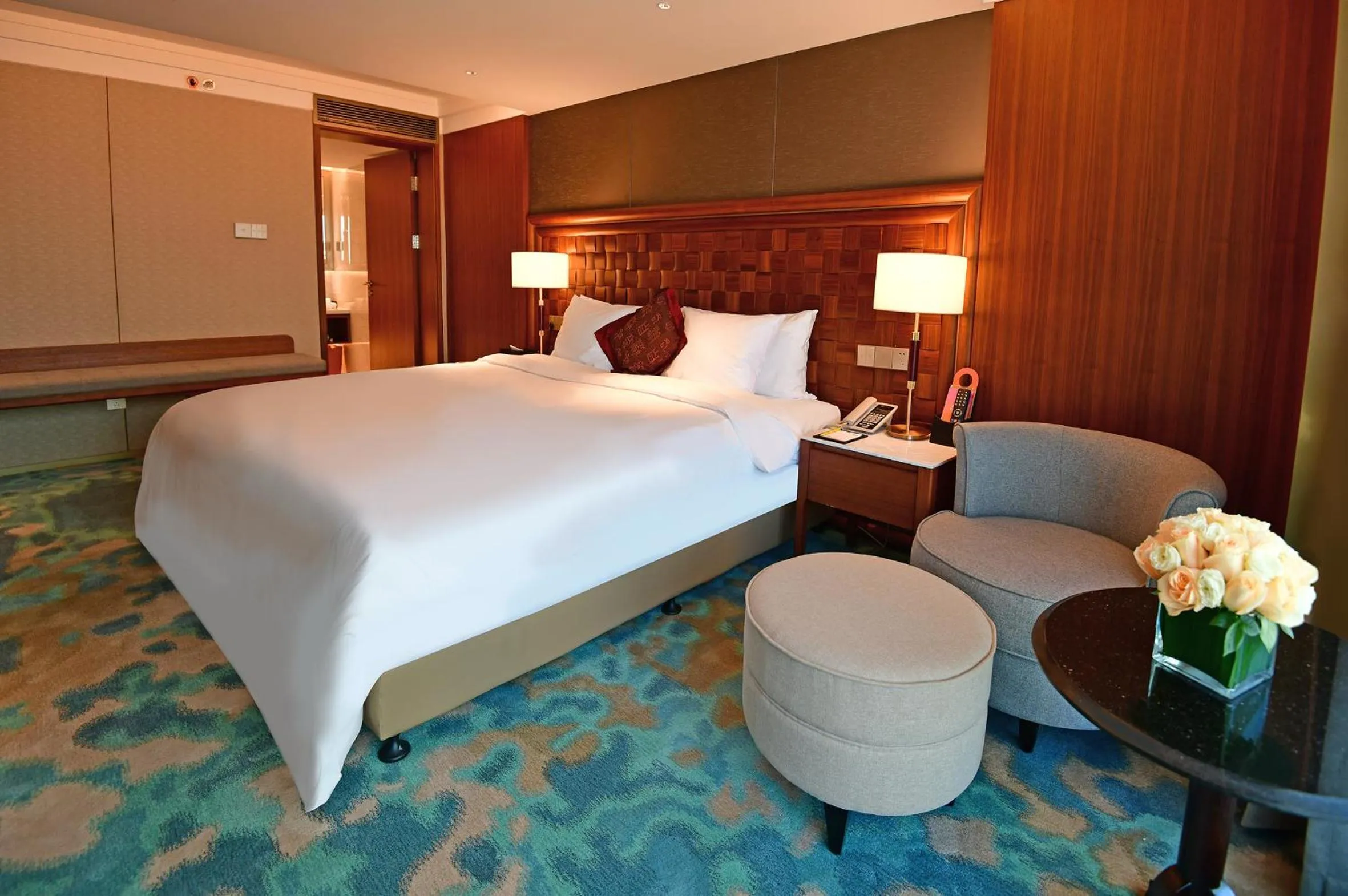 Bed in V-Continent Beijing Parkview Wuzhou Hotel