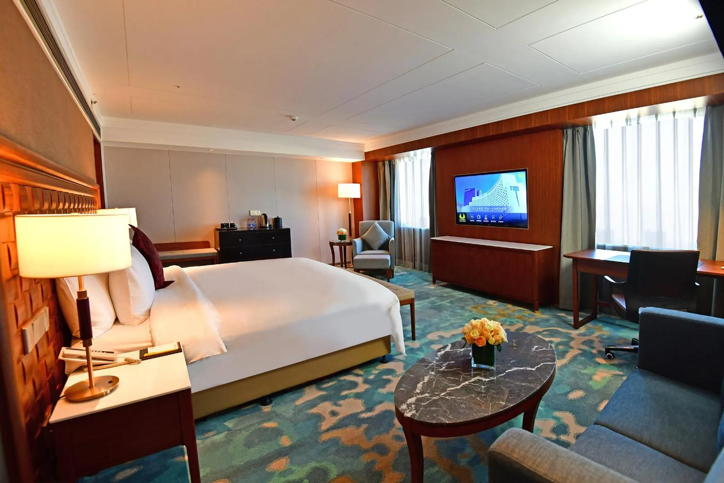 Bed in V-Continent Beijing Parkview Wuzhou Hotel