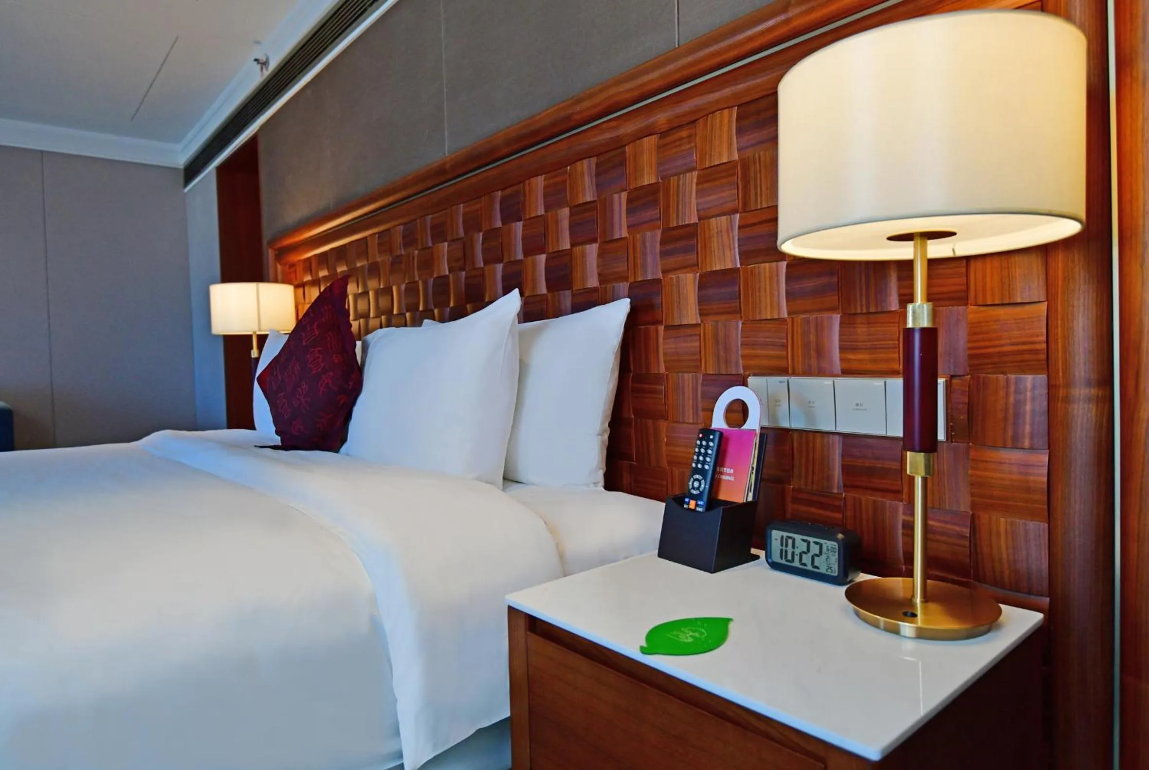 Bed in V-Continent Beijing Parkview Wuzhou Hotel