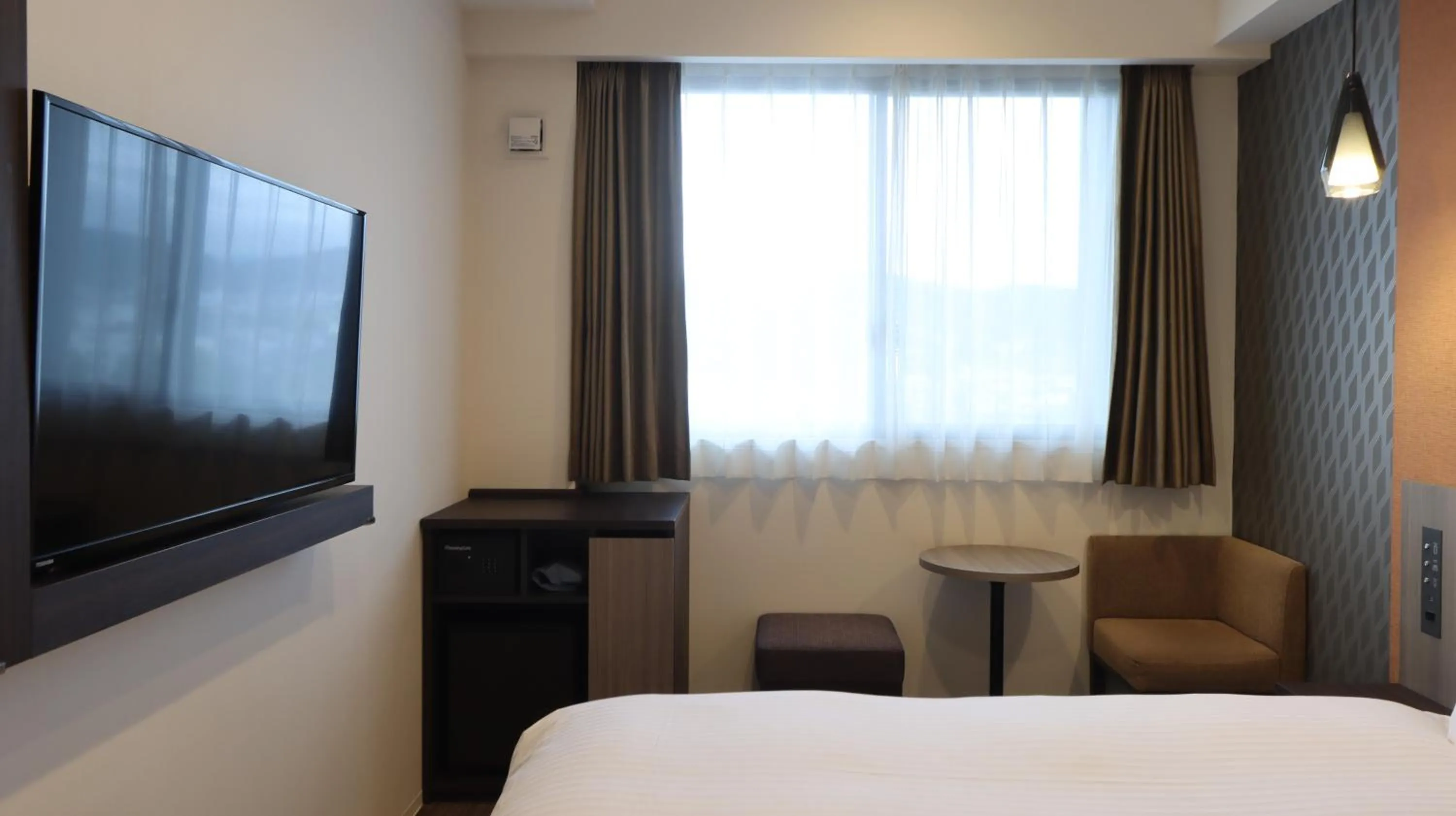 Bed in Wander Kyoto Nanajo