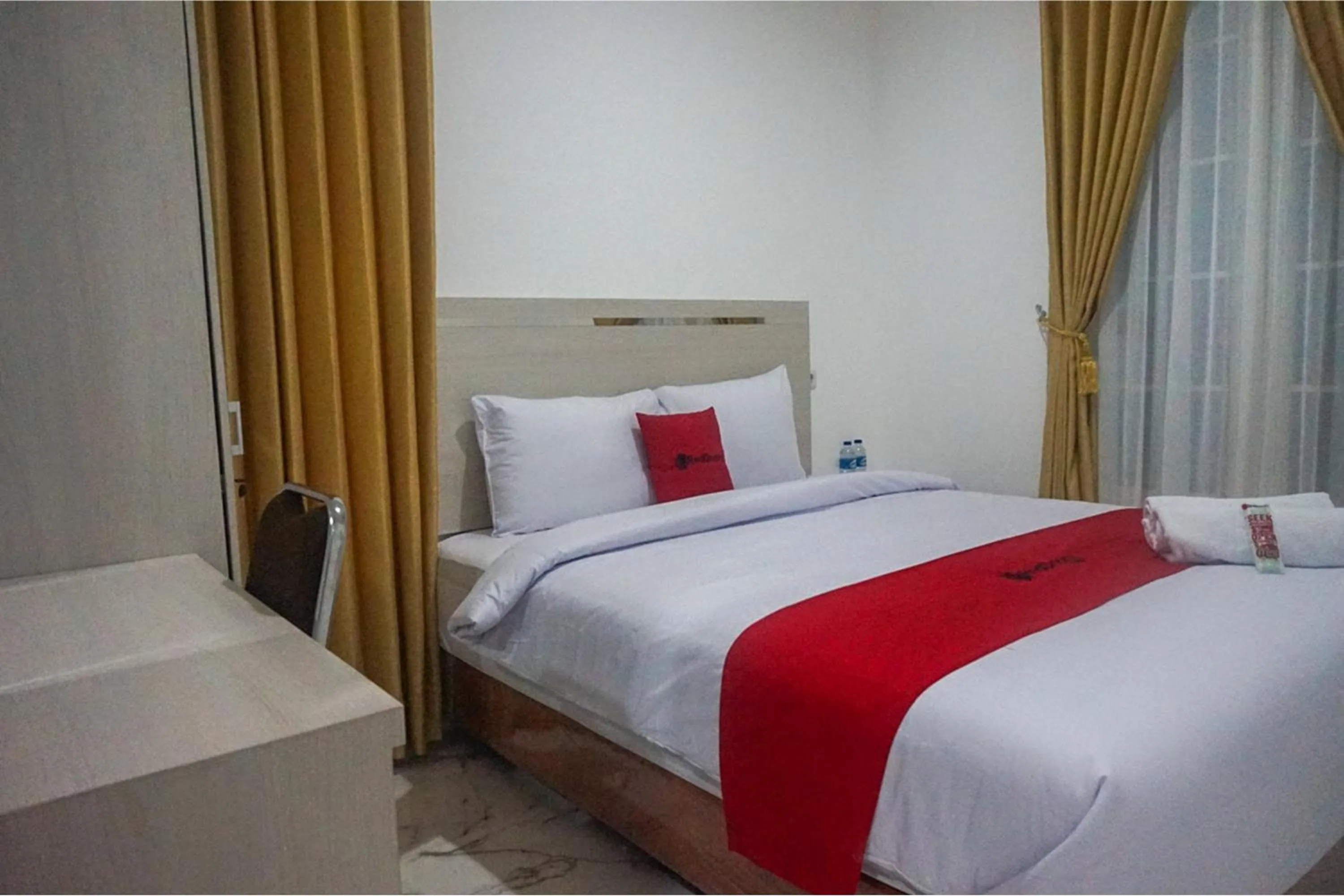 Bed in RedDoorz near Araya Family Club House