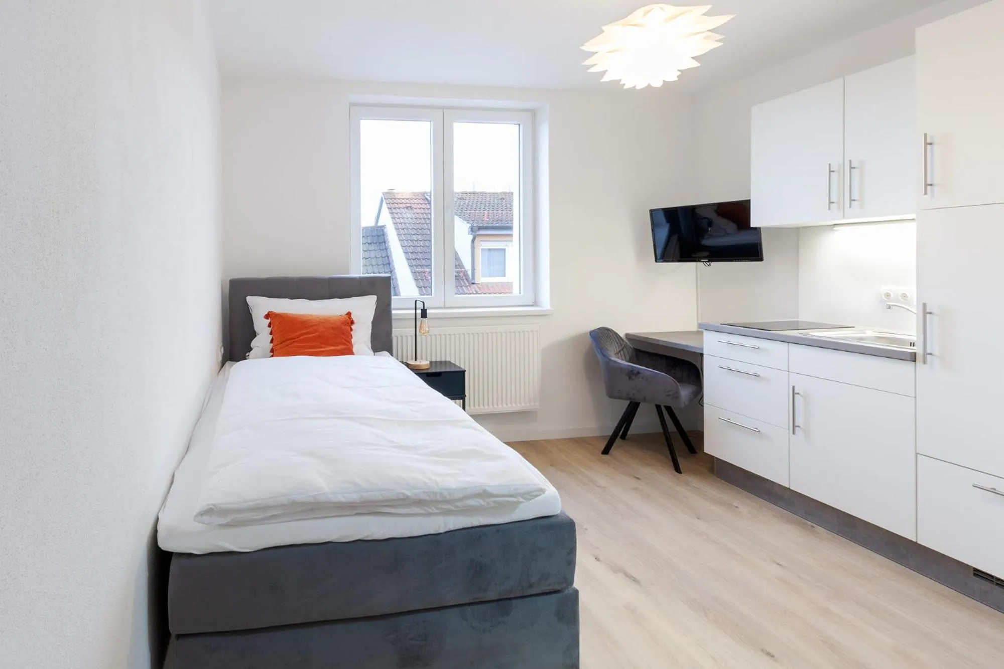 Photo of the whole room, Bed in STAY@MA Boardinghouse Mannheim