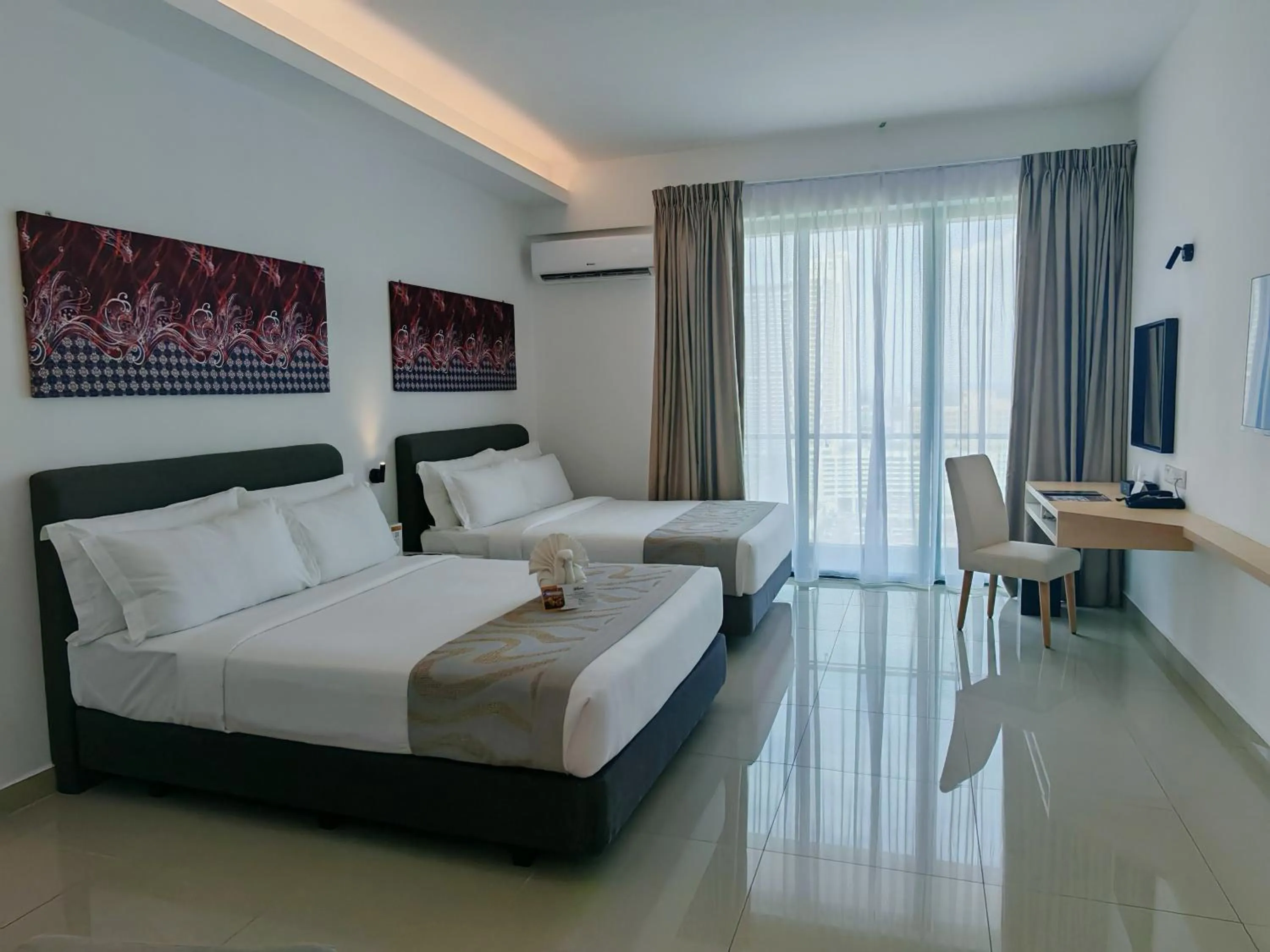 Bed in Swan Garden Resort Hotel