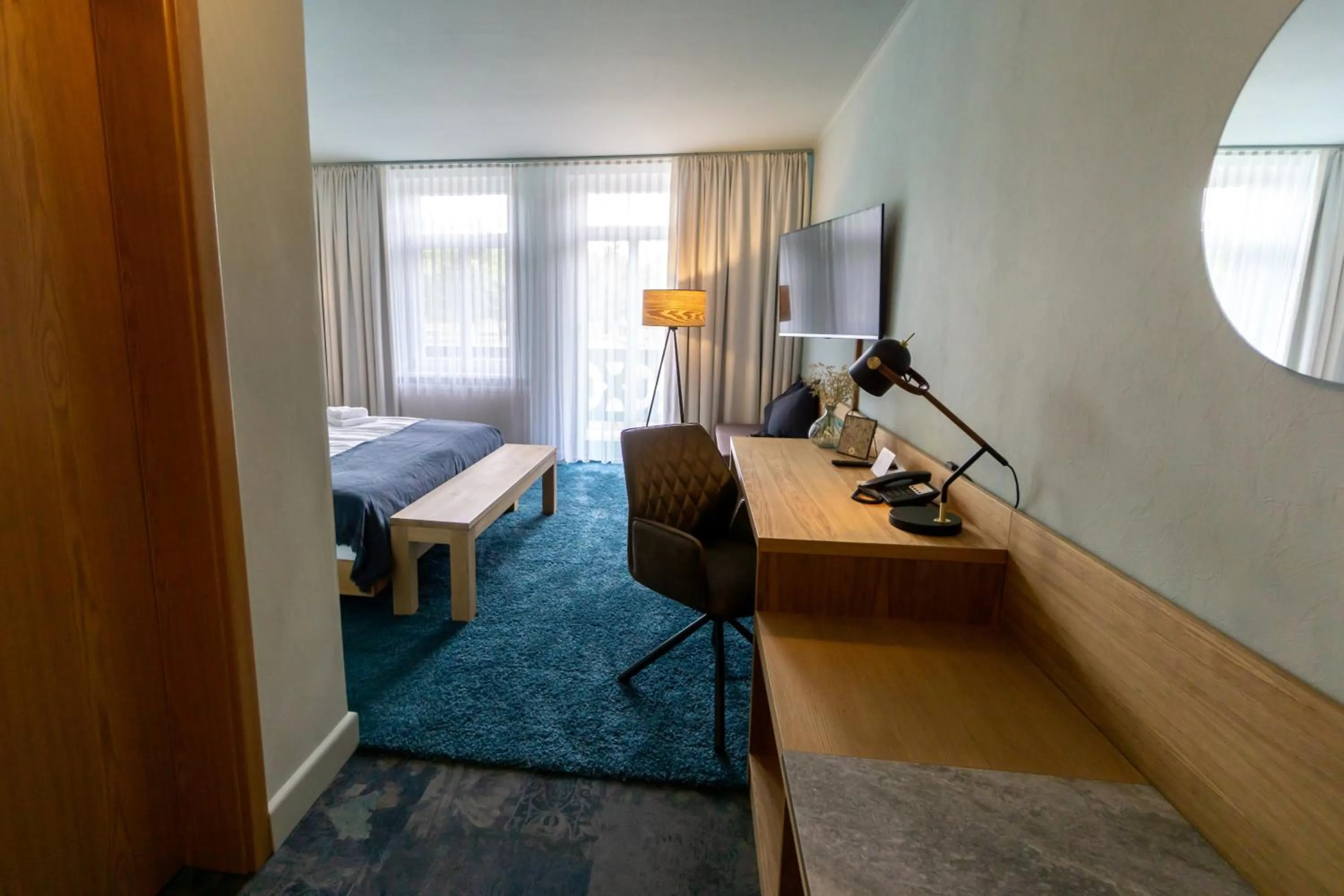 Photo of the whole room, Bed in Waldhotel Eiche