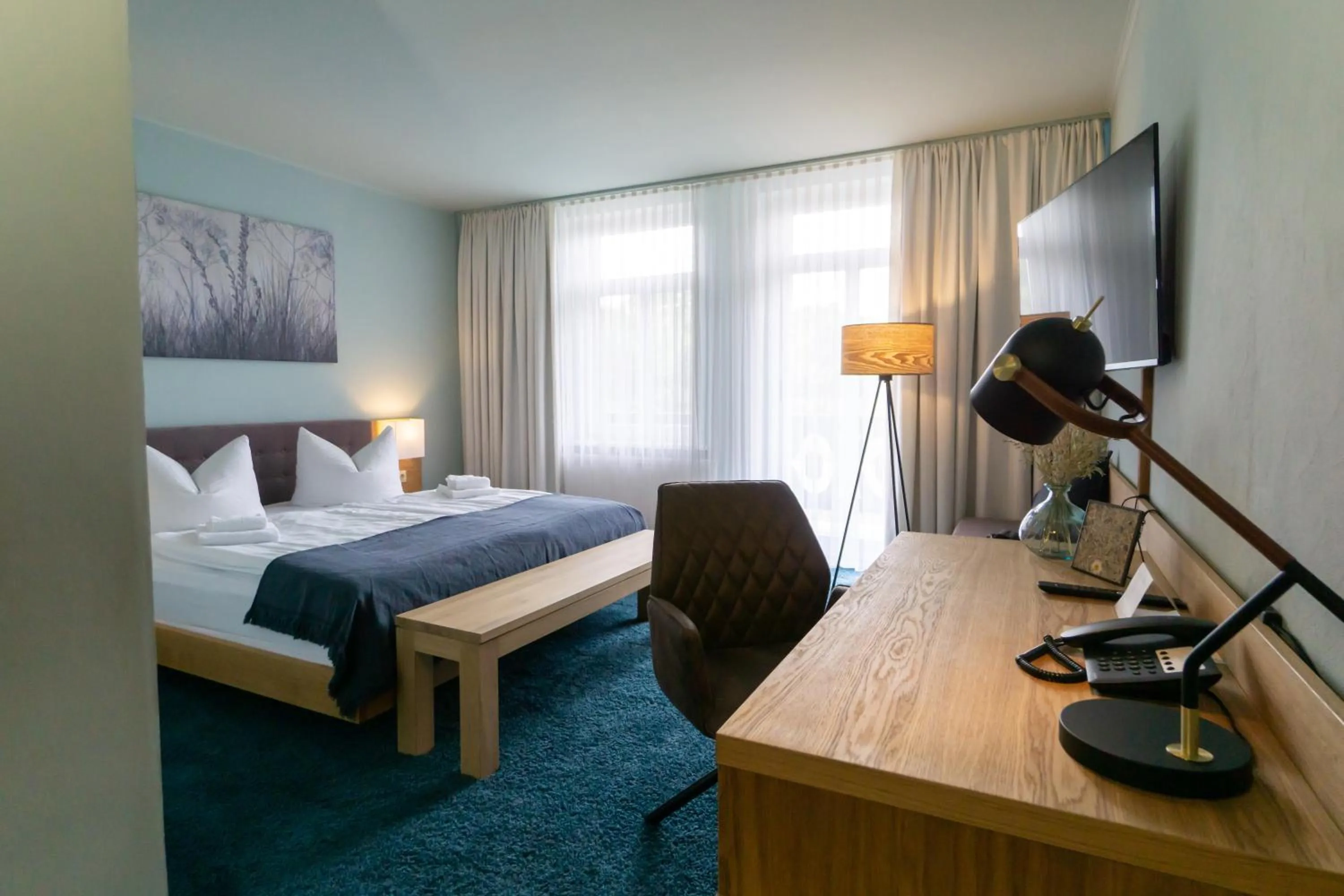 Photo of the whole room, Bed in Waldhotel Eiche