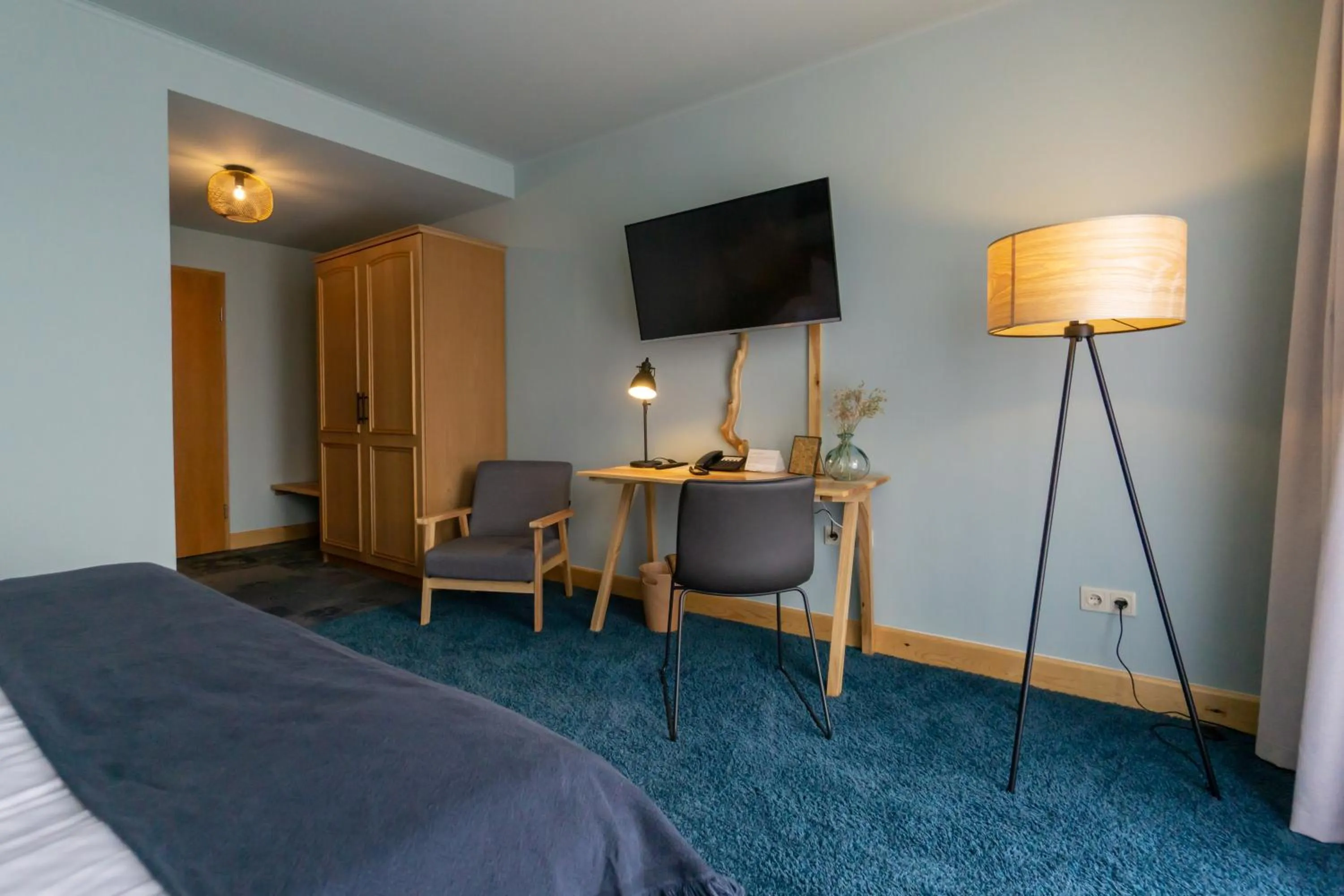 Photo of the whole room, Bed in Waldhotel Eiche