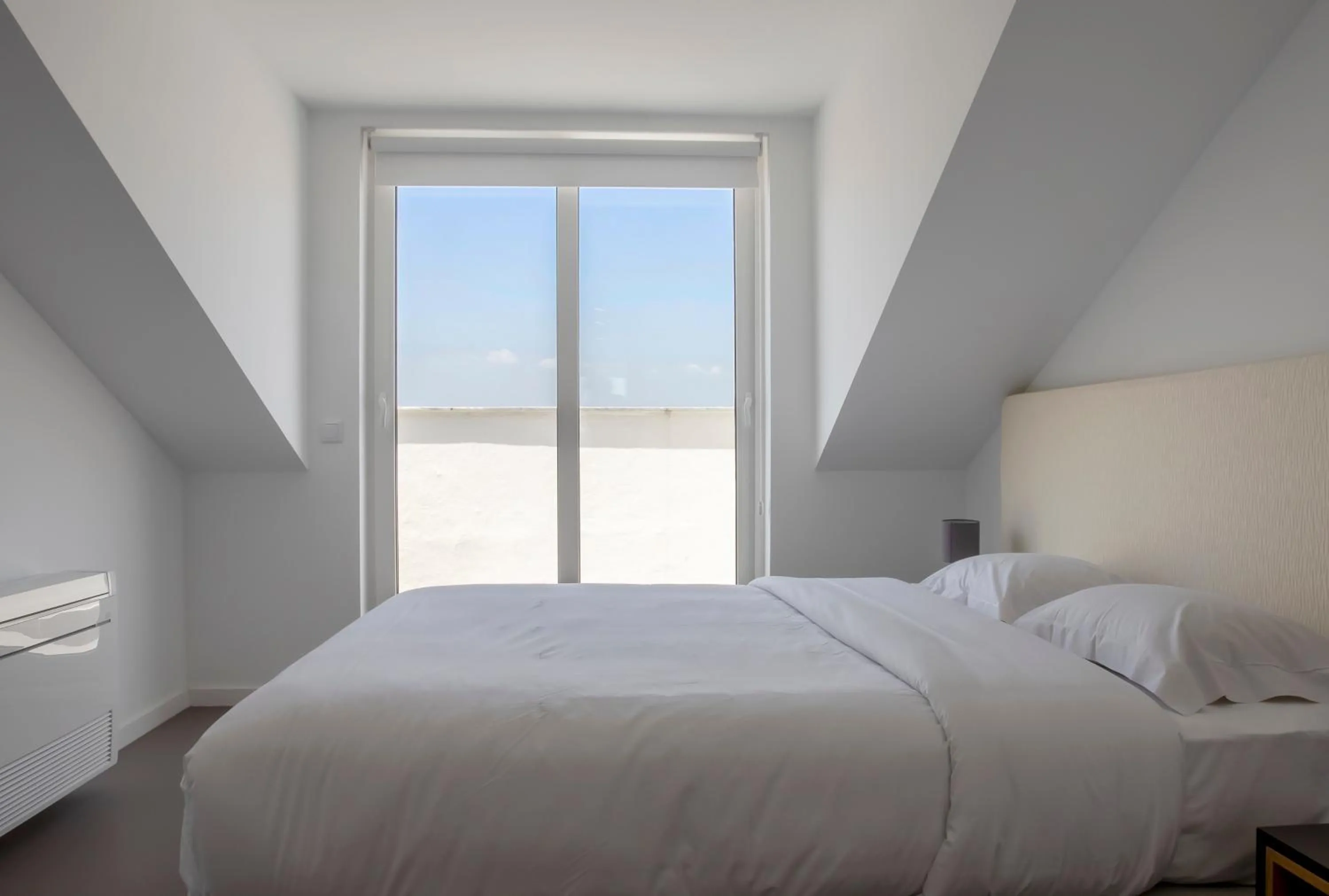 Bed in Oscar Concept Apartments