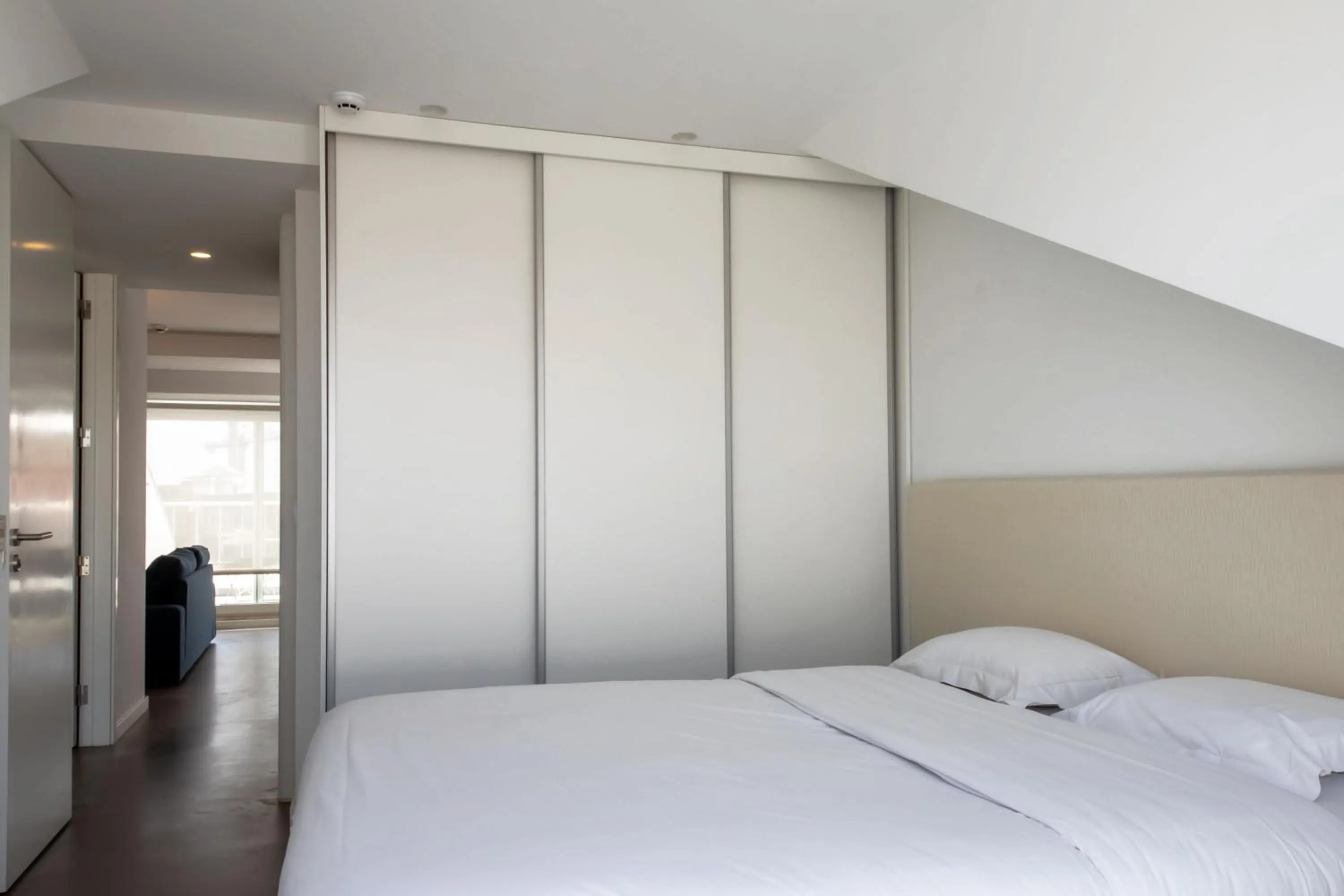 Bed in Oscar Concept Apartments