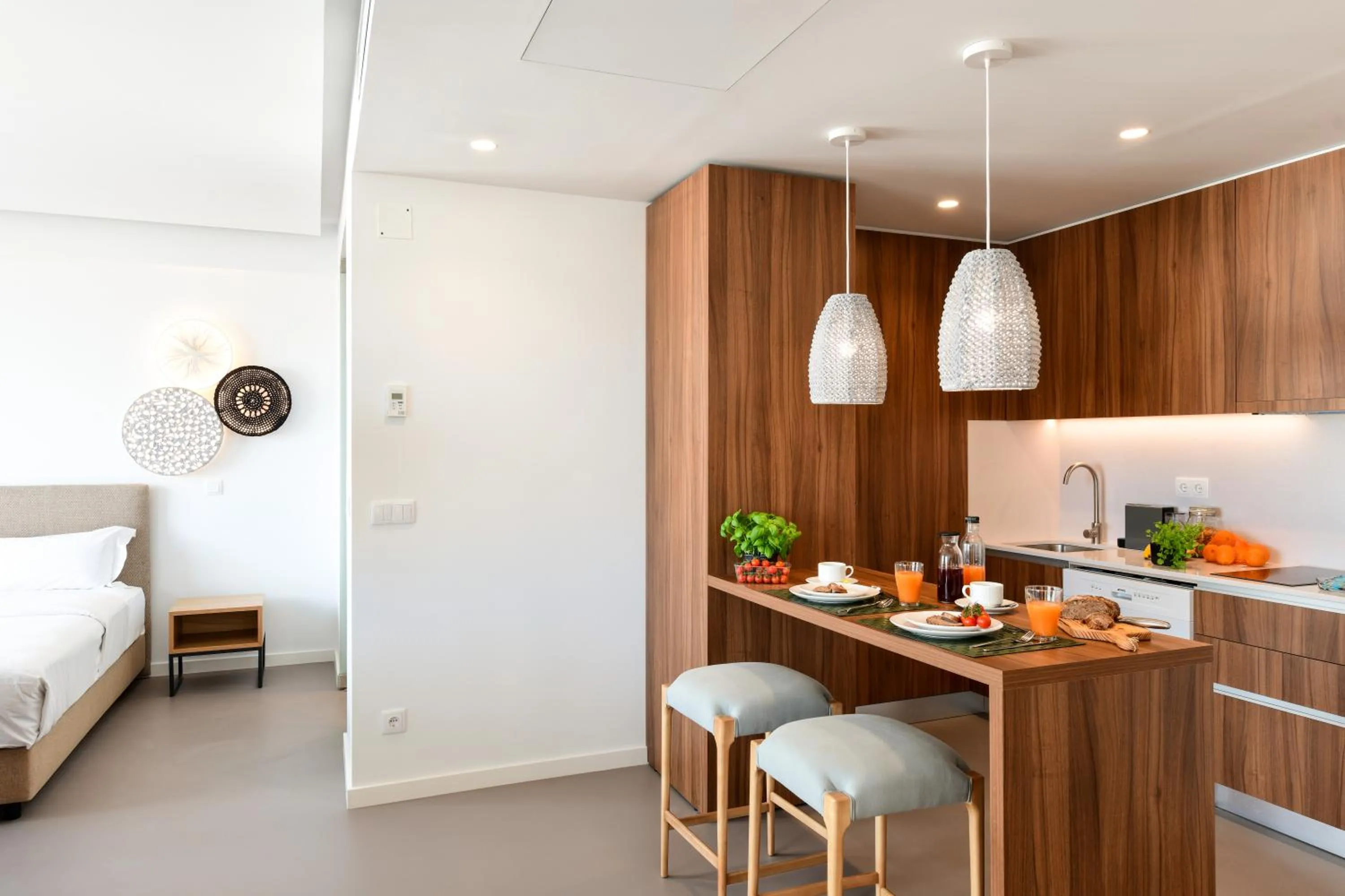 Bed in Oscar Concept Apartments