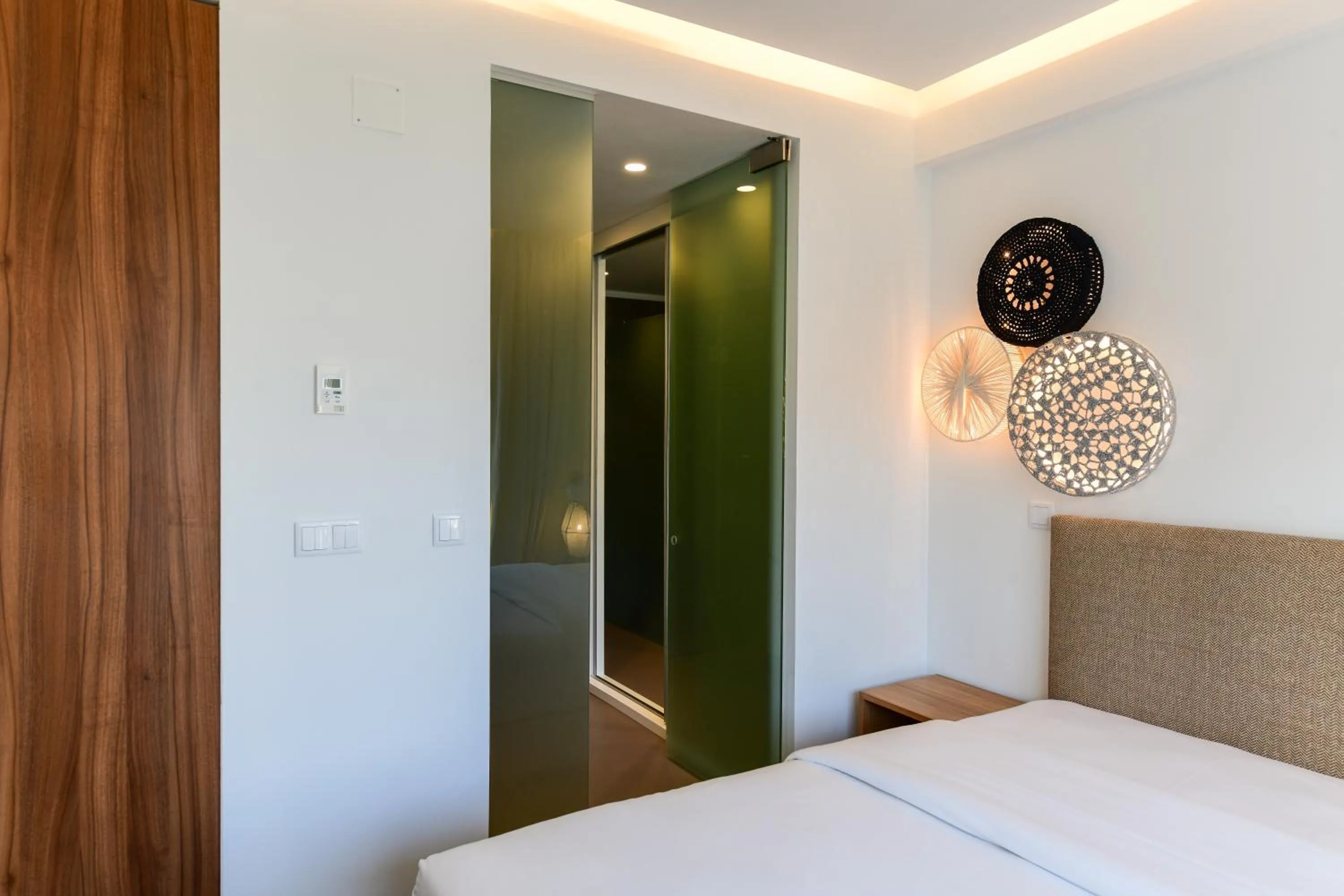 Bed in Oscar Concept Apartments