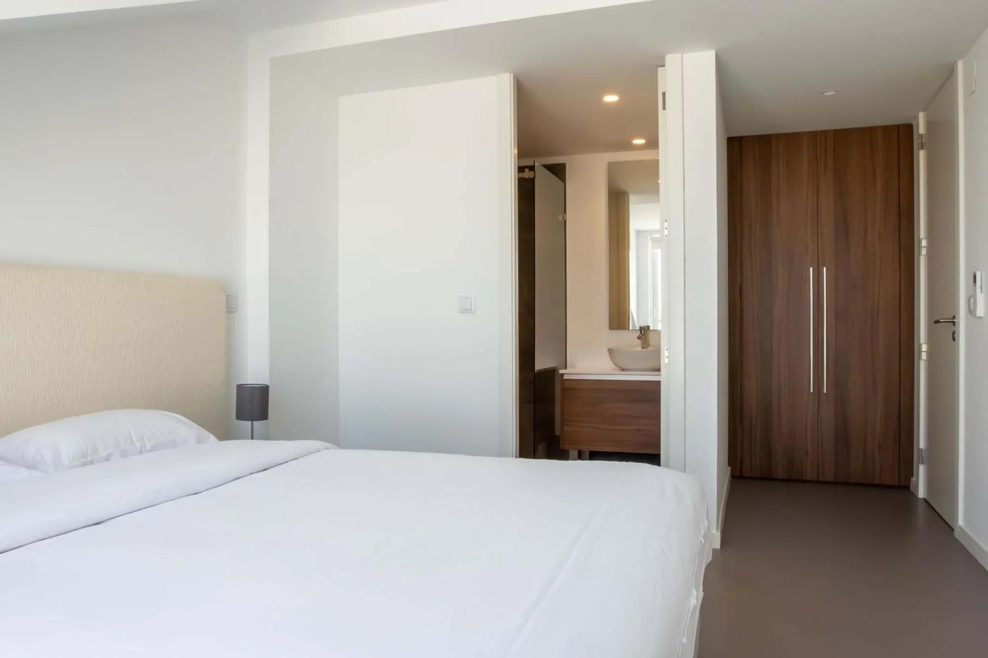 Bed in Oscar Concept Apartments