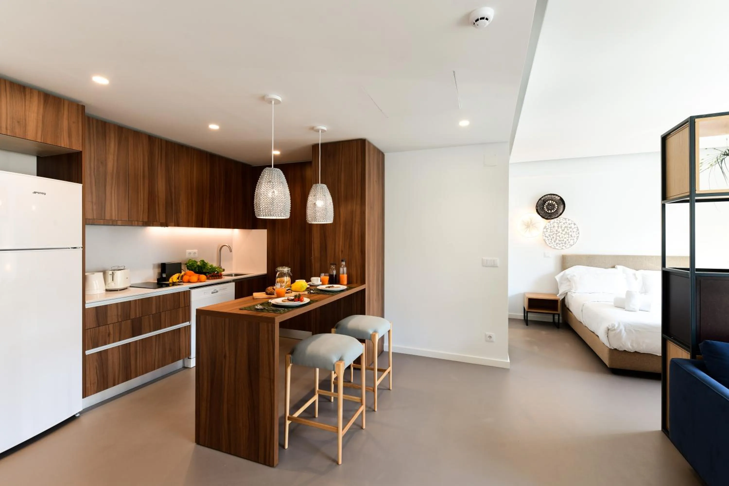 Bed in Oscar Concept Apartments