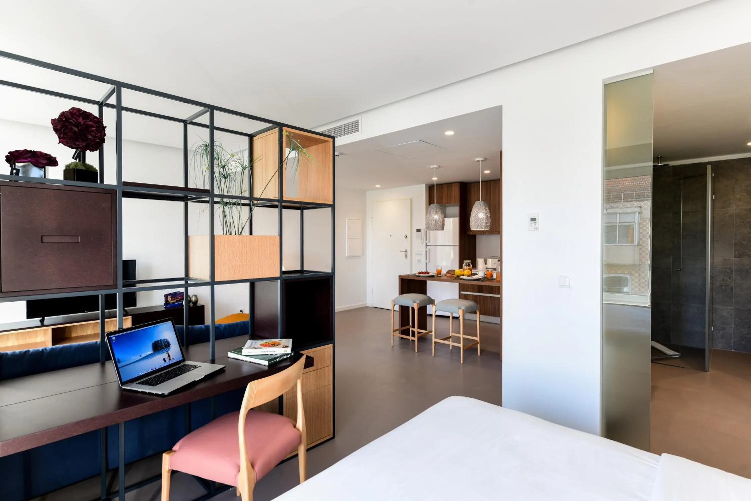 Bed in Oscar Concept Apartments