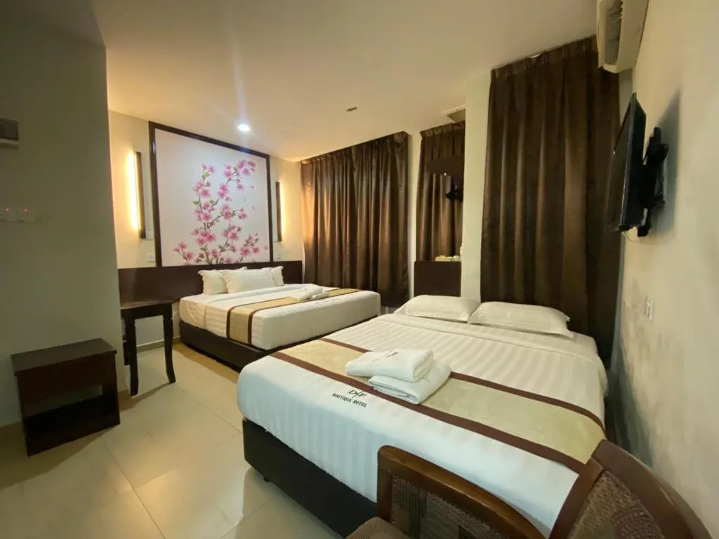 Bed in D&F BOUTIQUE HOTEL SENAWANG