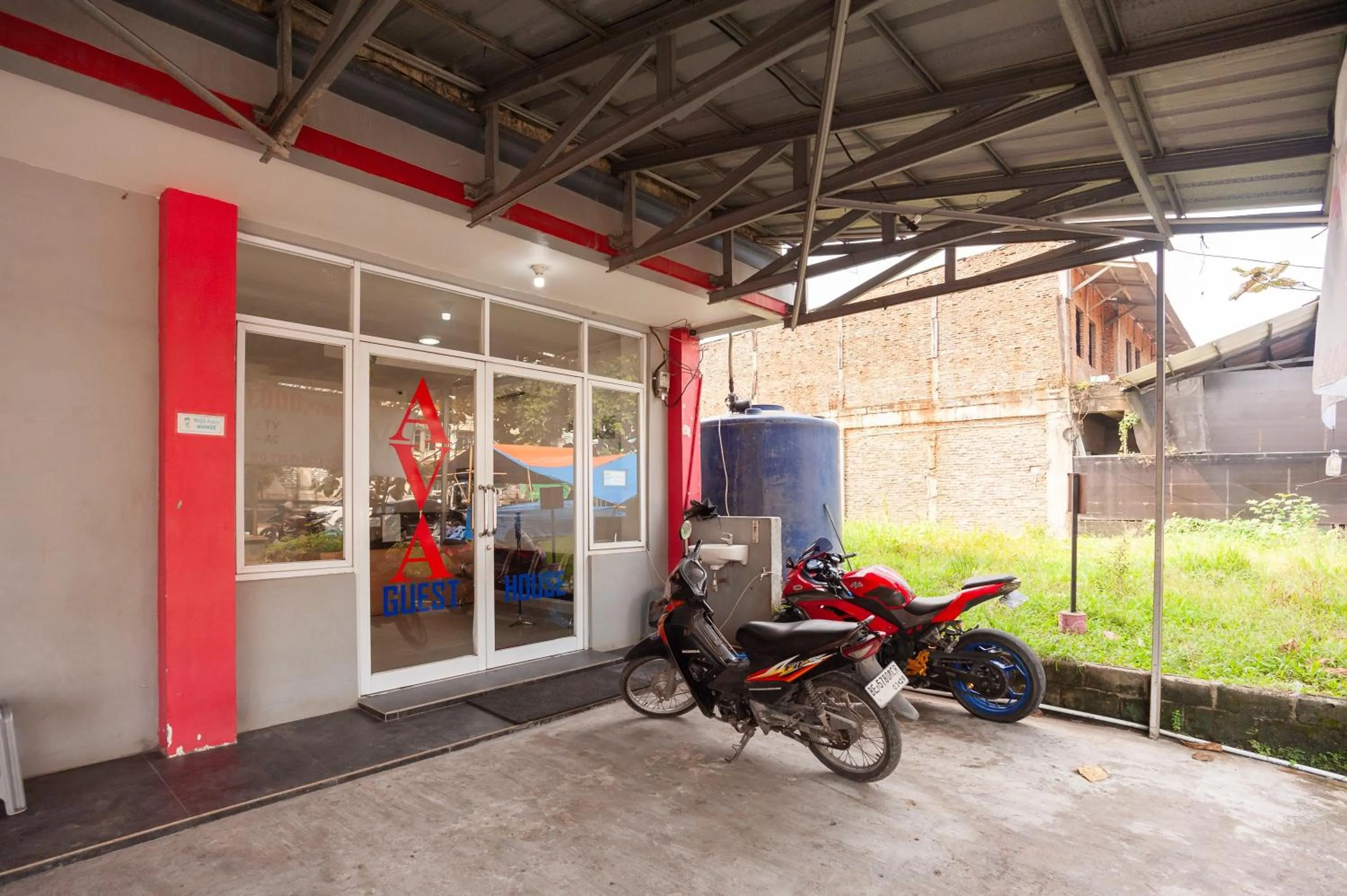 Facade/entrance in AVA Guesthouse Mitra RedDoorz Lampung