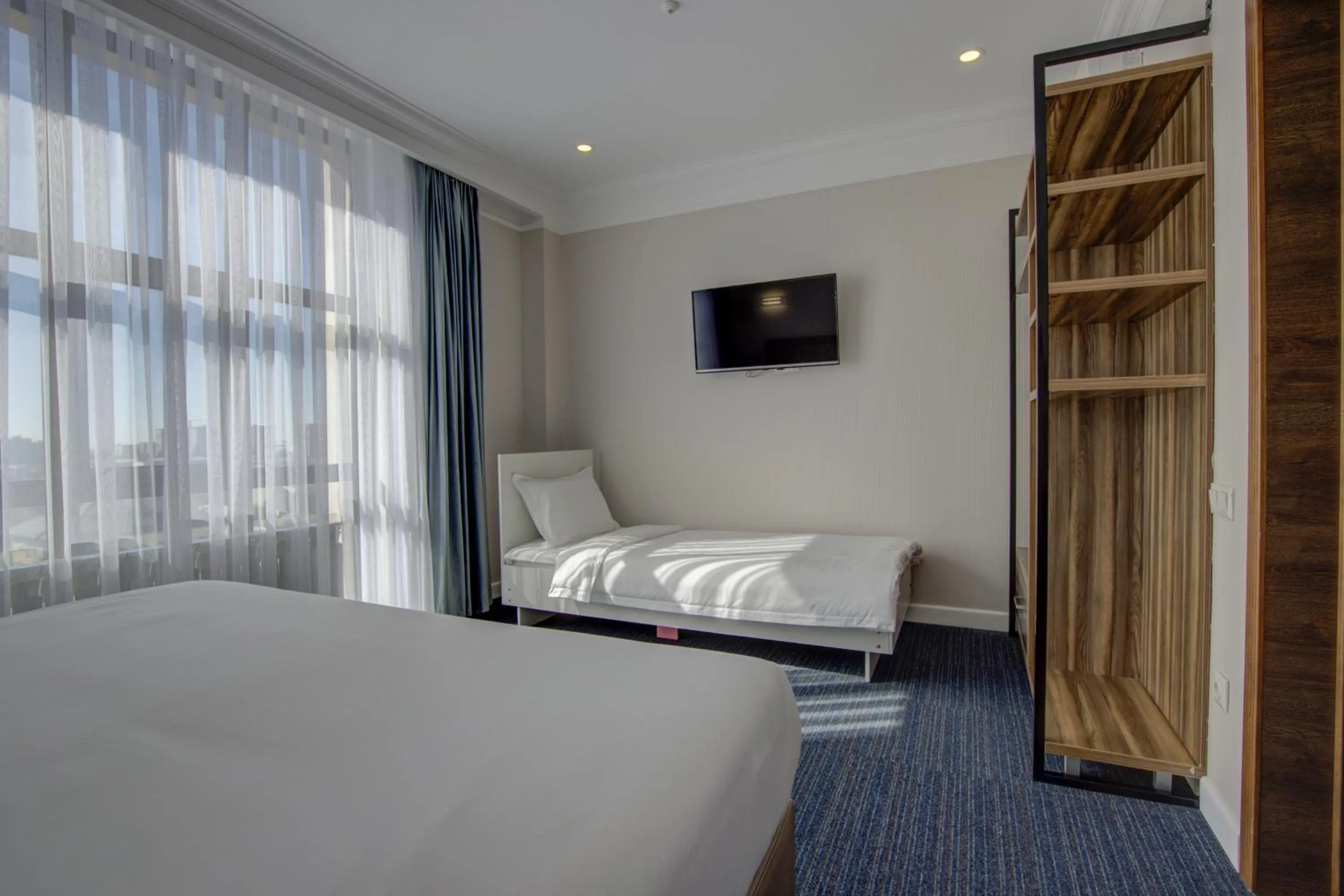 Bed in Hotel Resident Bishkek