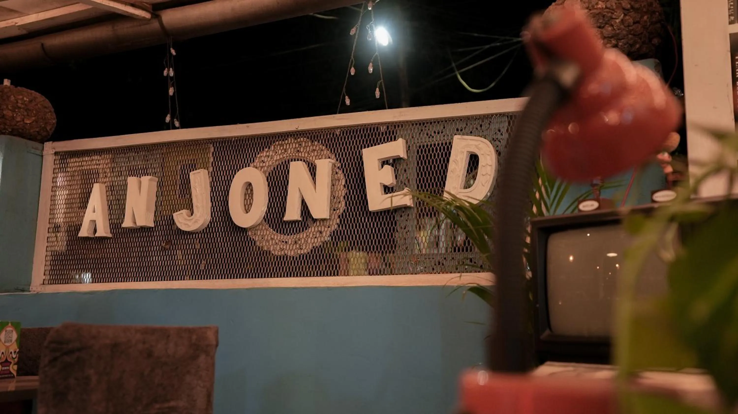 Property logo or sign in Anjoned Hostel & Cafe