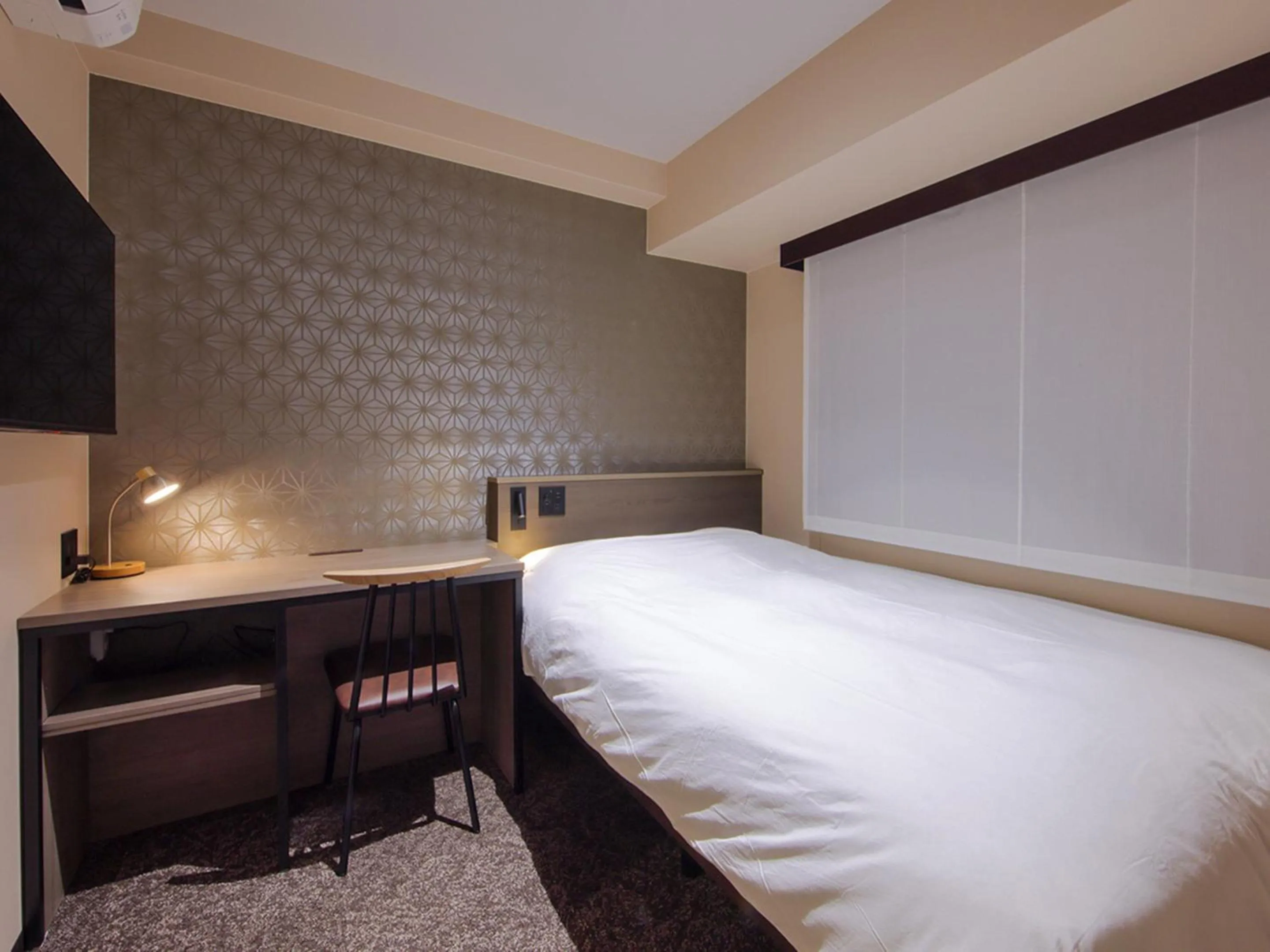 Photo of the whole room, Bed in Hotel SUI Kobe Sannomiya by ABEST