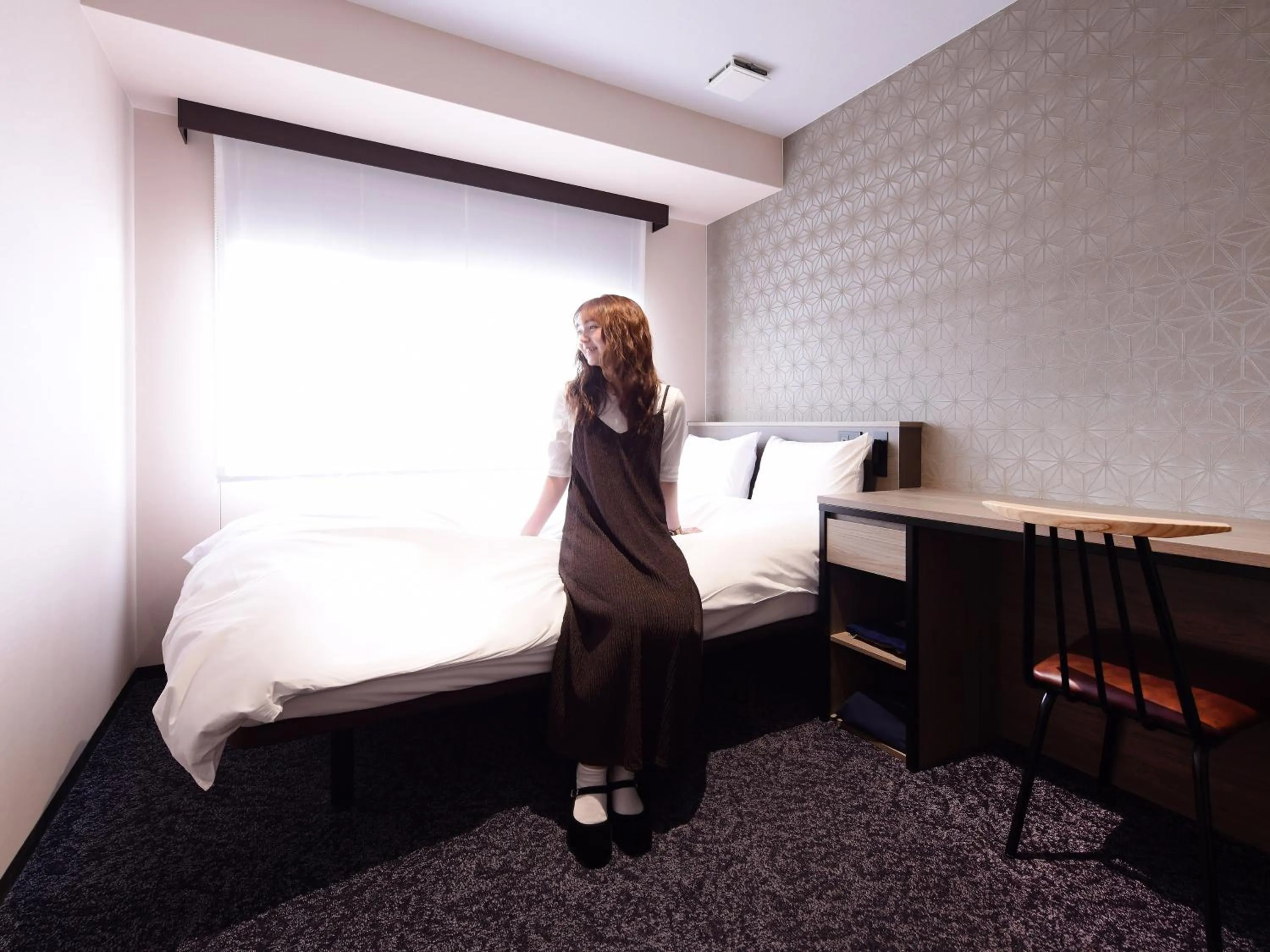 Photo of the whole room, Bed in Hotel SUI Kobe Sannomiya by ABEST