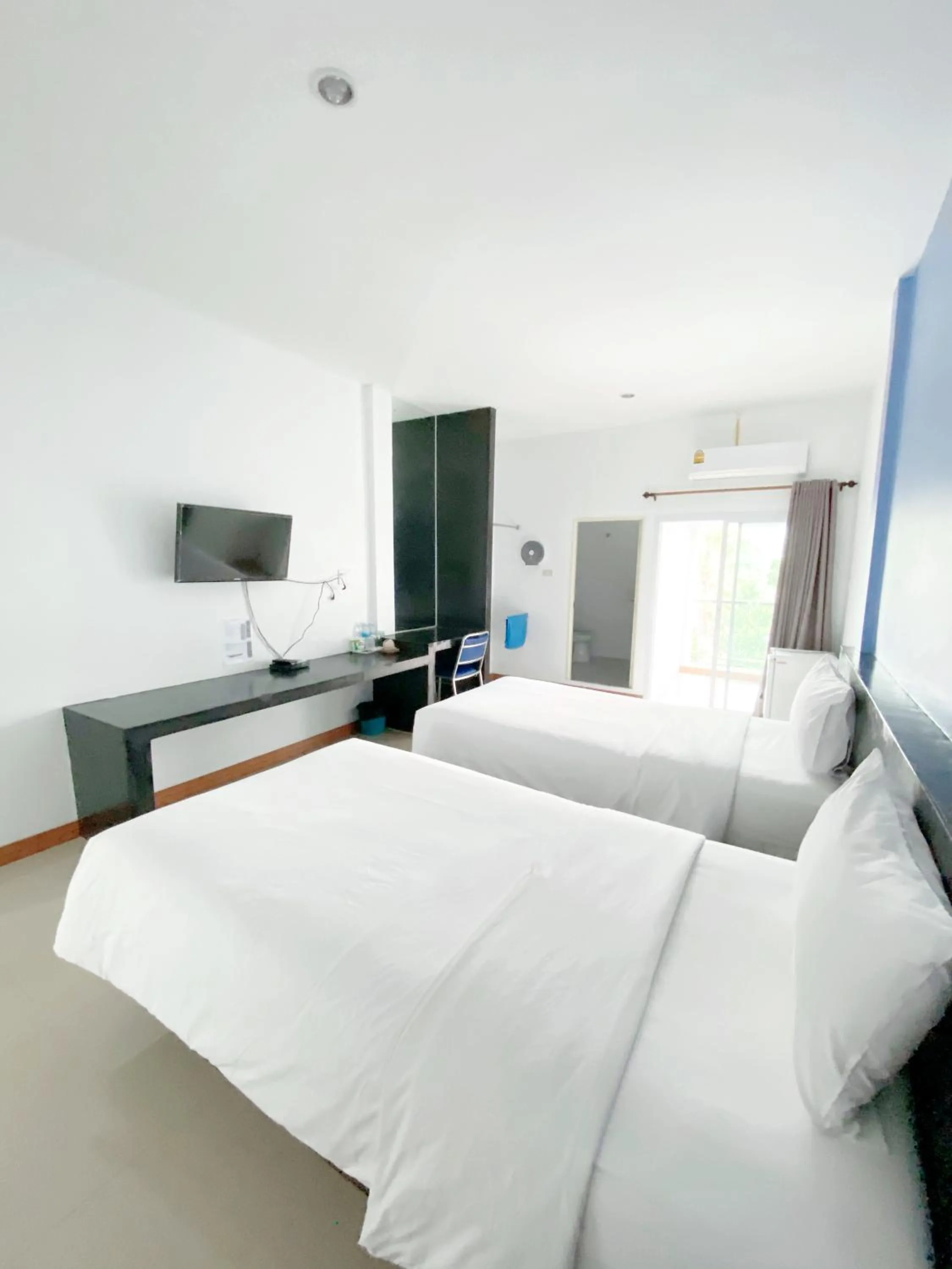 Bed in Tanatnan Hotel