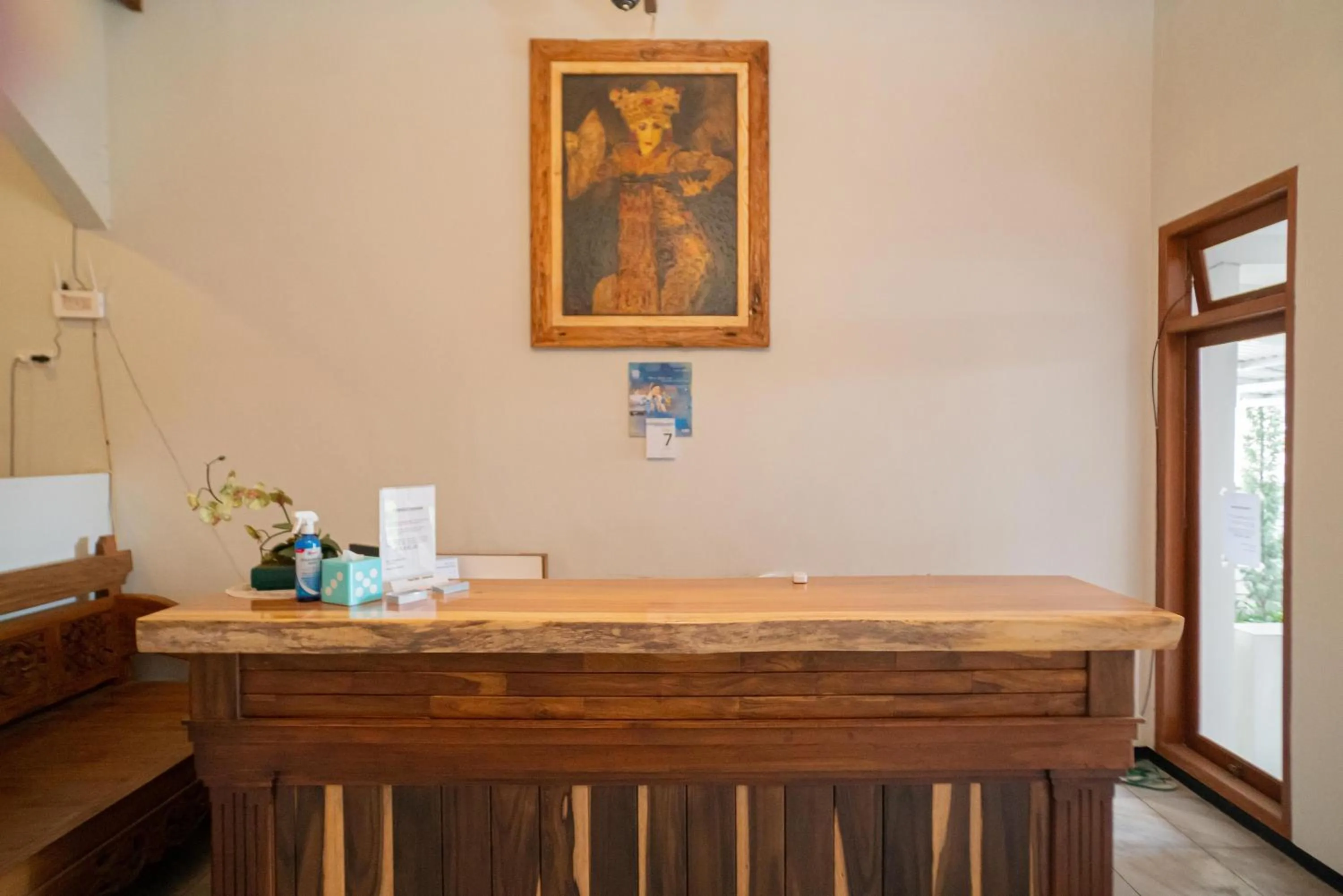 Lobby or reception in Urbanview Hotel Bubusini Batu by RedDoorz