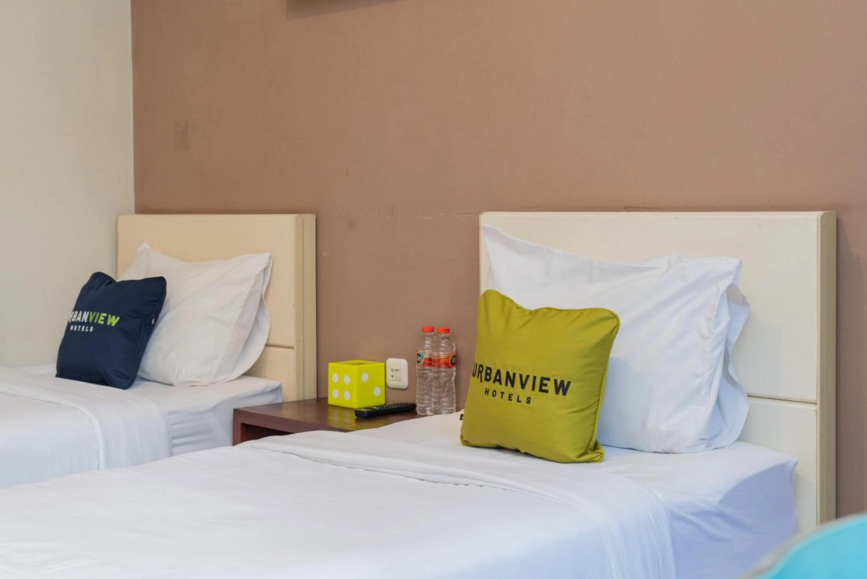 Bedroom, Bed in Urbanview Hotel Bubusini Batu by RedDoorz