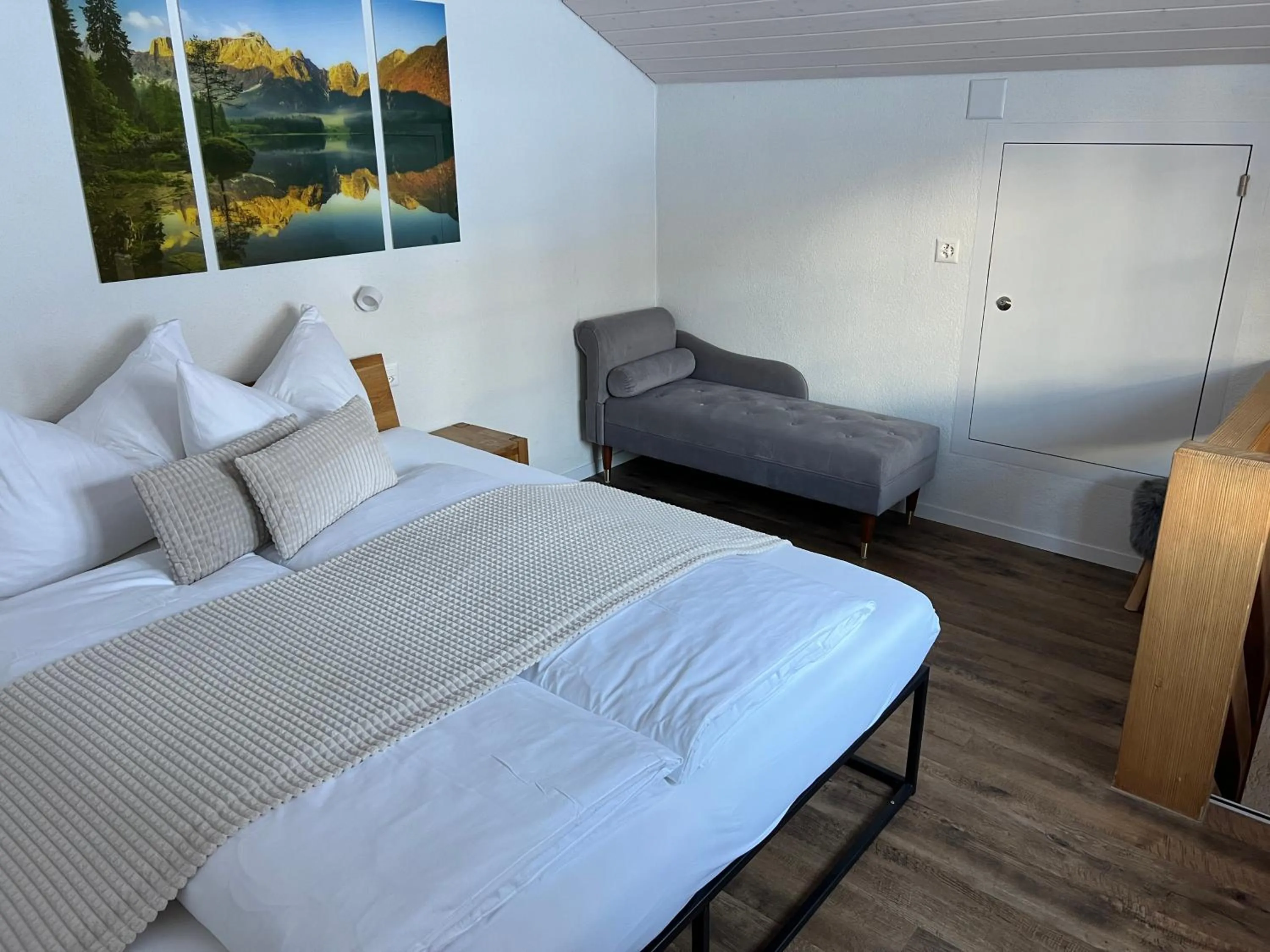 Bed in Hotel Jägerstübli Grindelwald