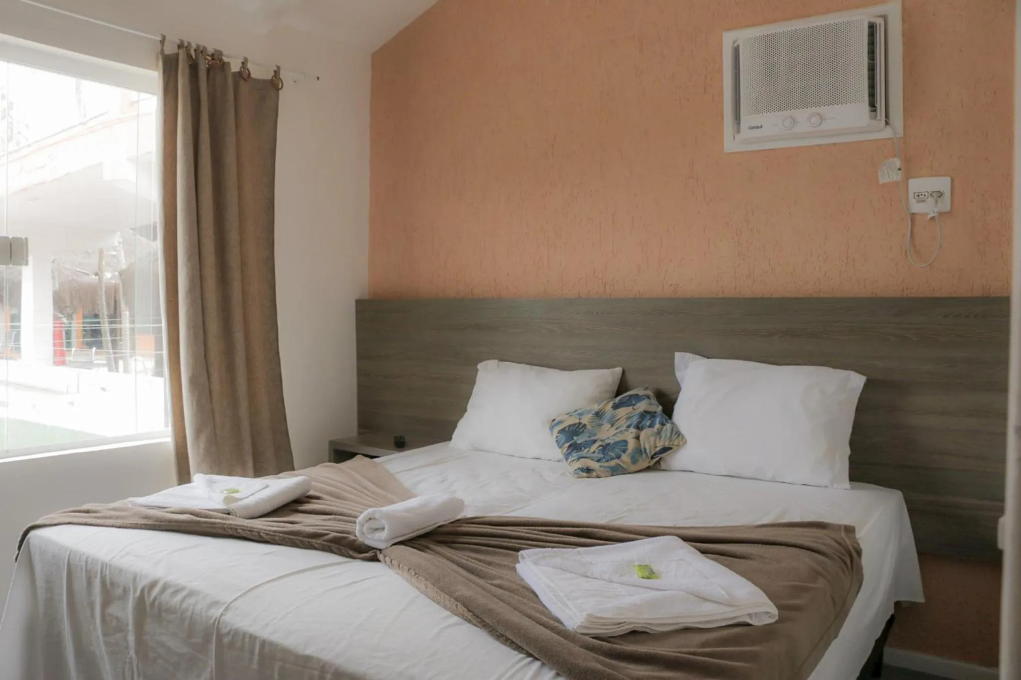 Bed in Tarumã Búzios Hotel