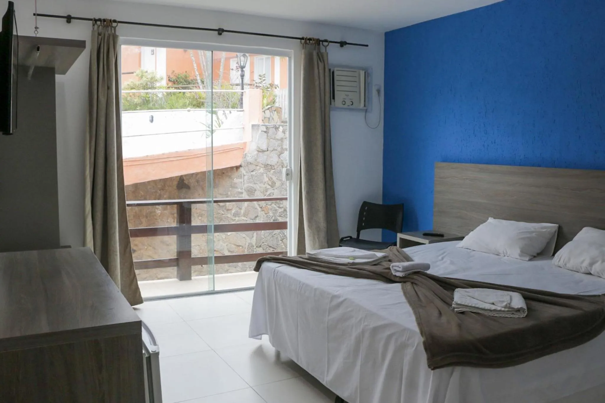 Bed in Tarumã Búzios Hotel