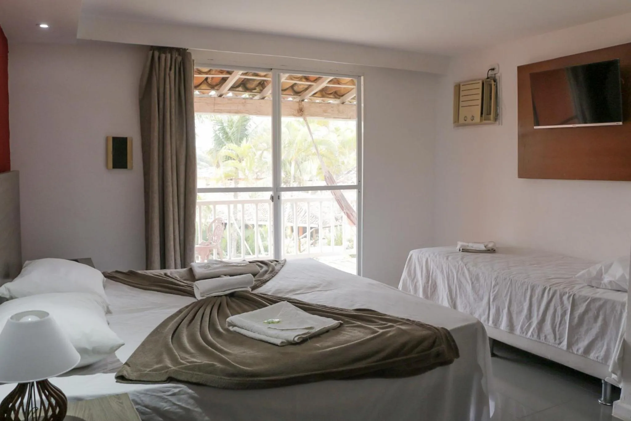 Bed in Tarumã Búzios Hotel