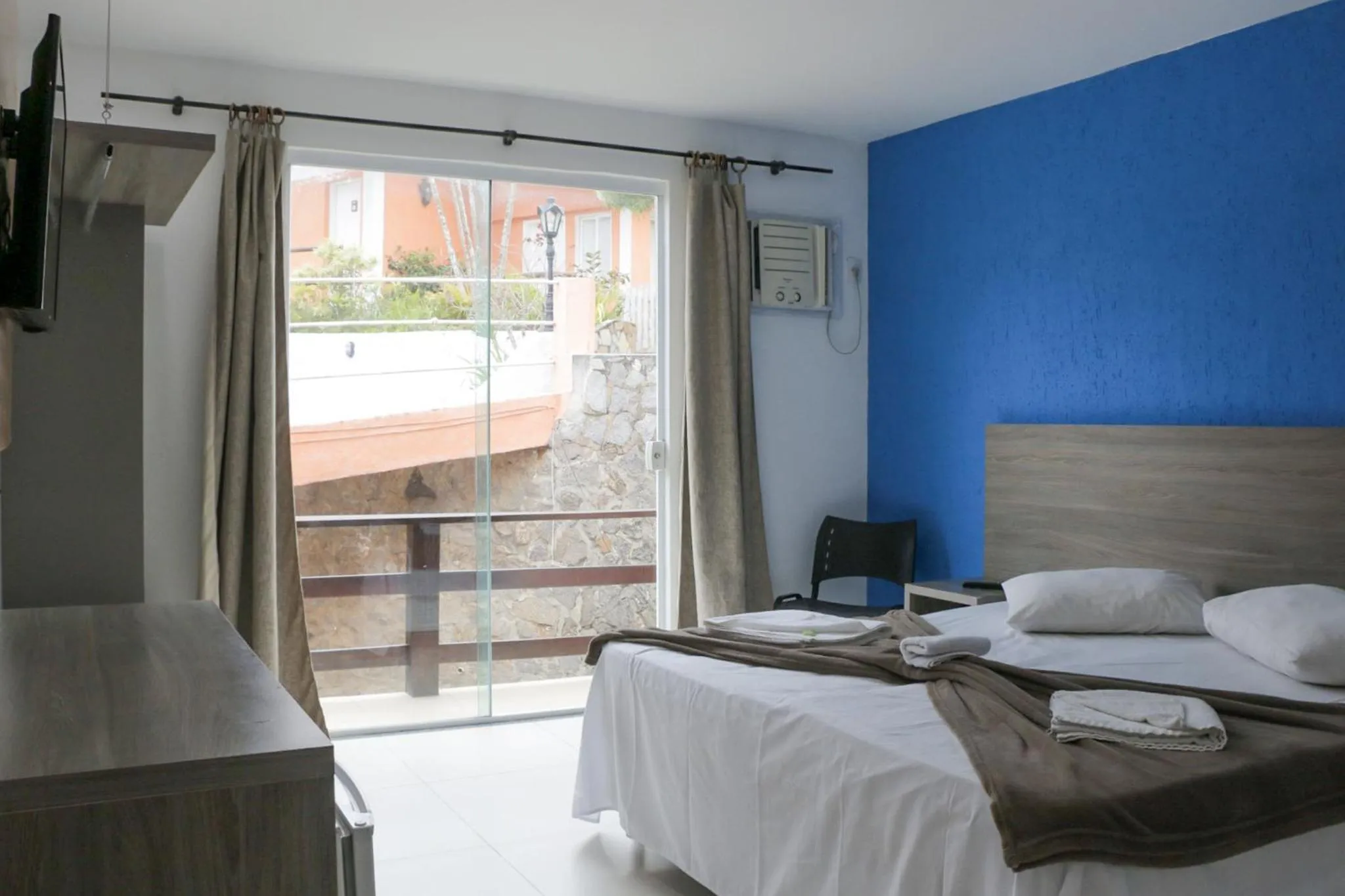 Bed in Tarumã Búzios Hotel