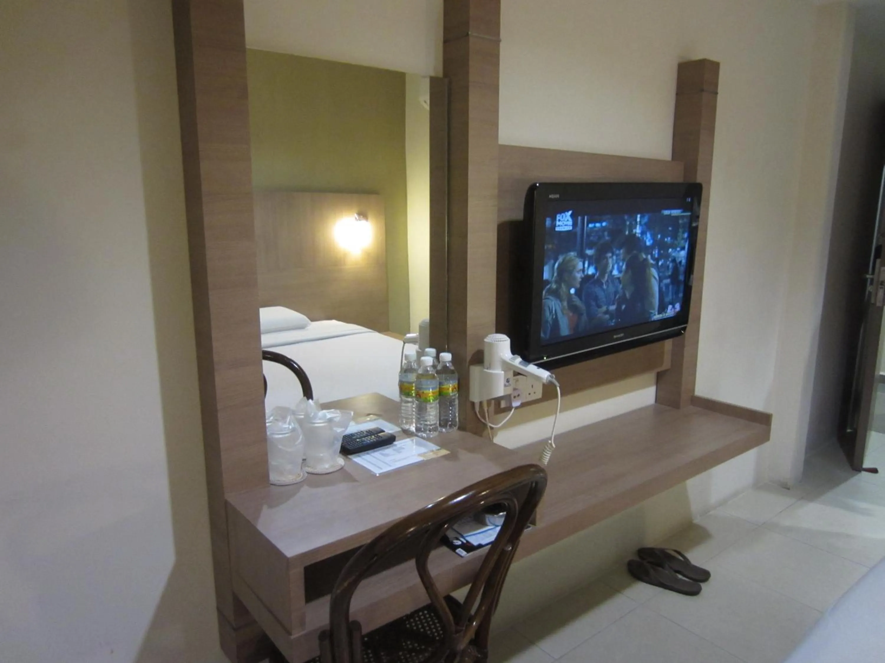 Bed in Radiant Hotel