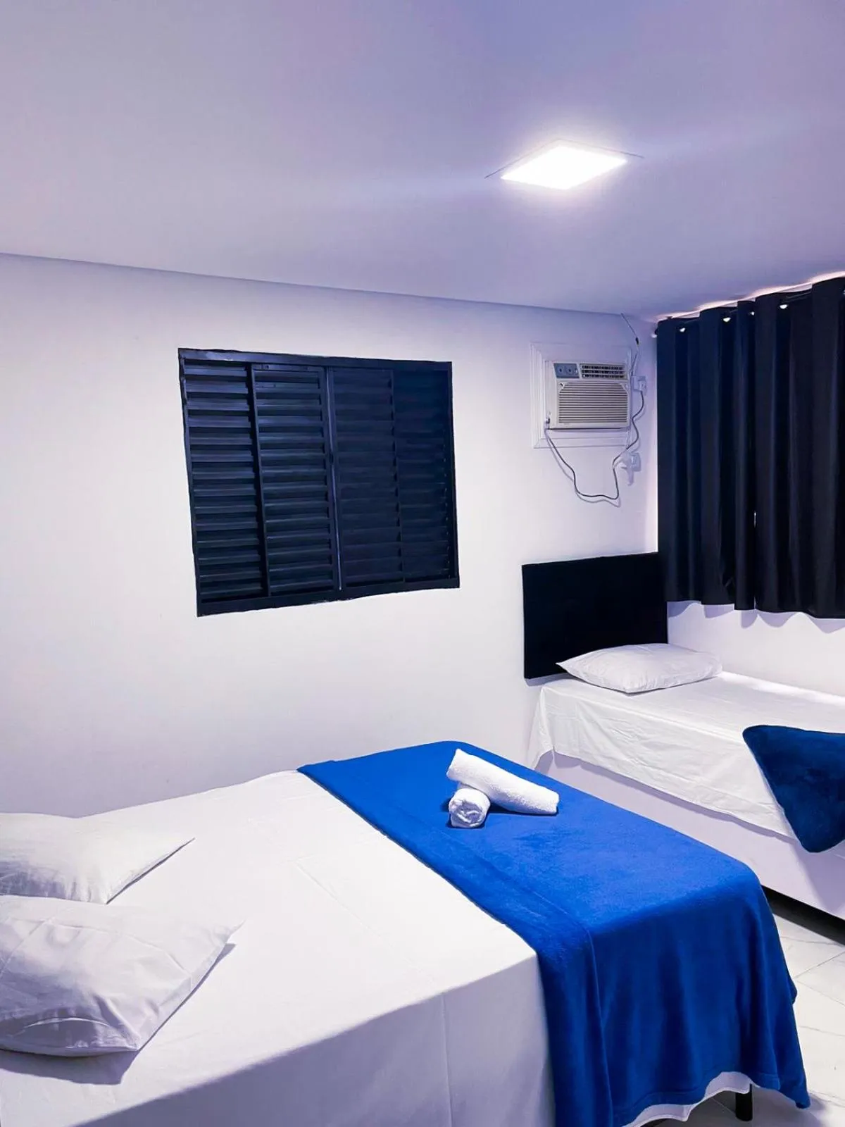 Bed in Pousada Praia do Tombo