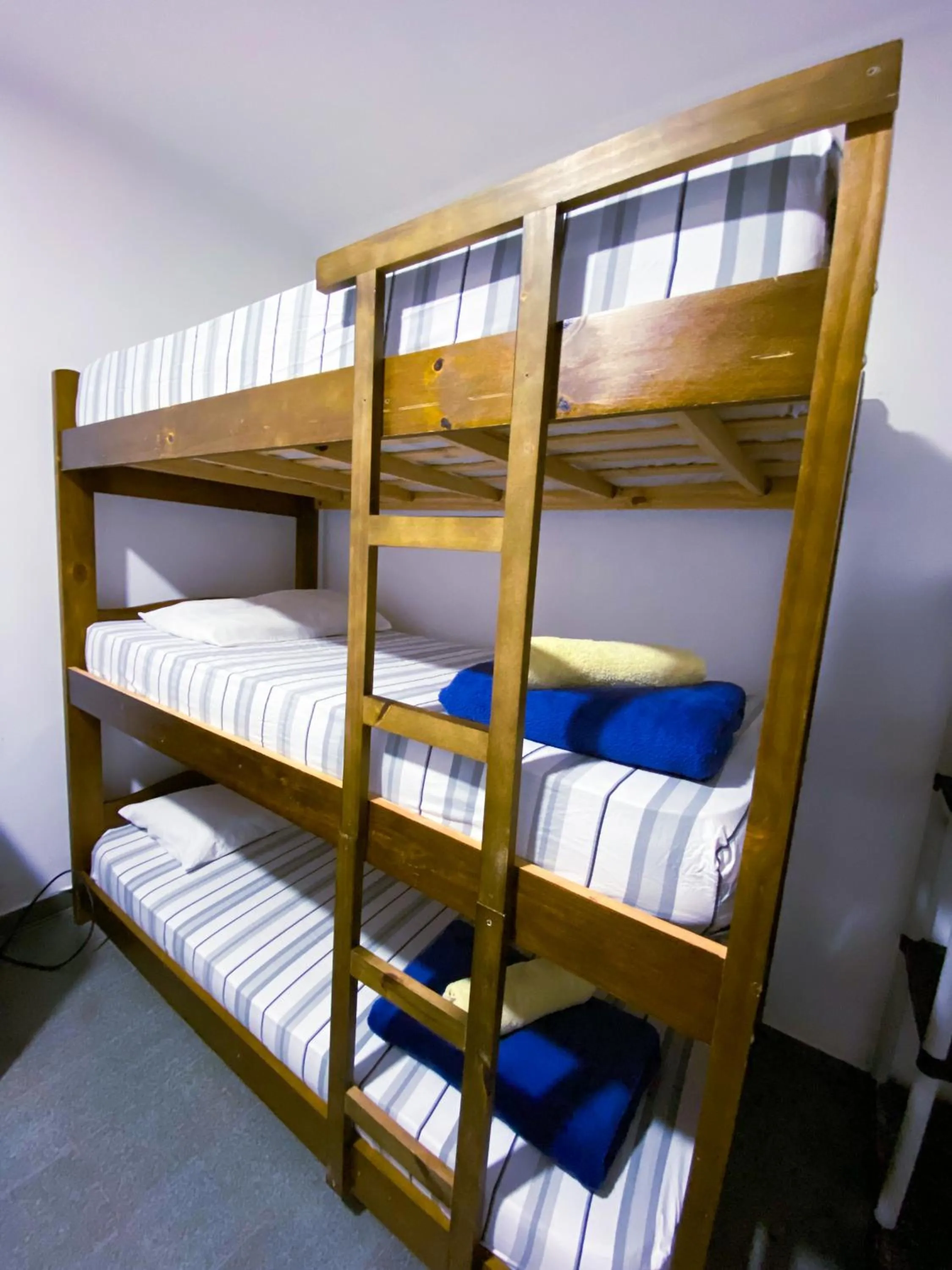 Bed in Pousada Praia do Tombo