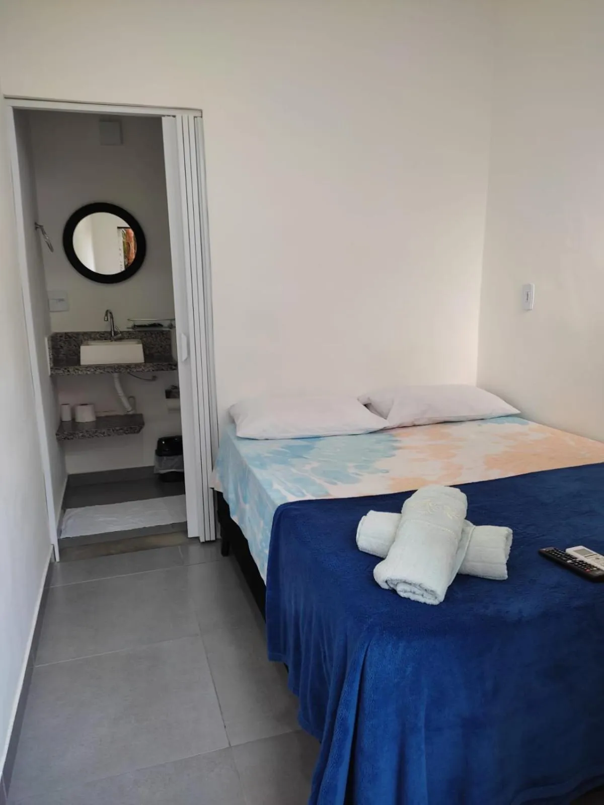 Bed in Pousada Praia do Tombo