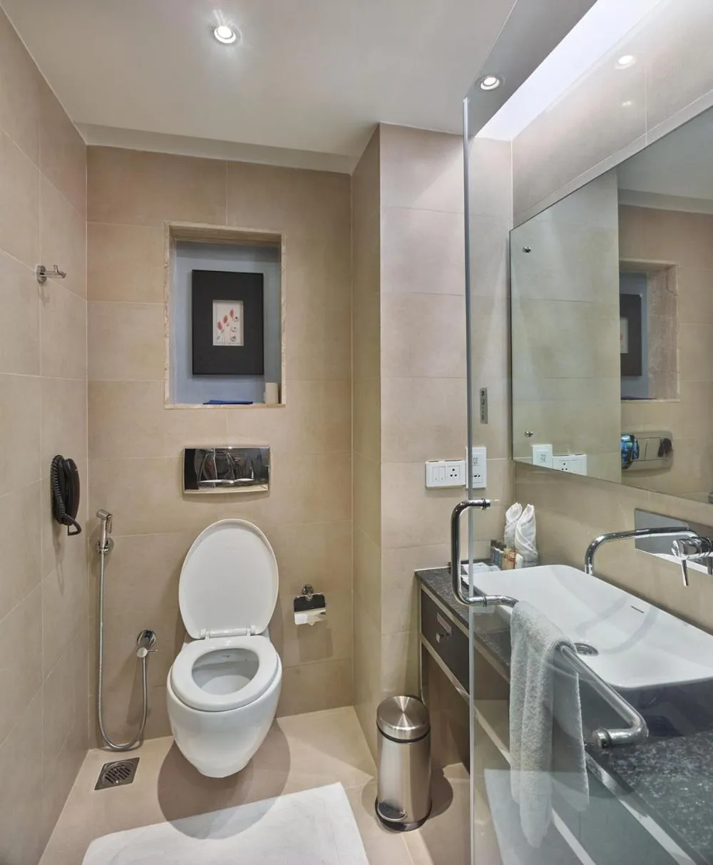 Toilet in HYCINTH Hotels