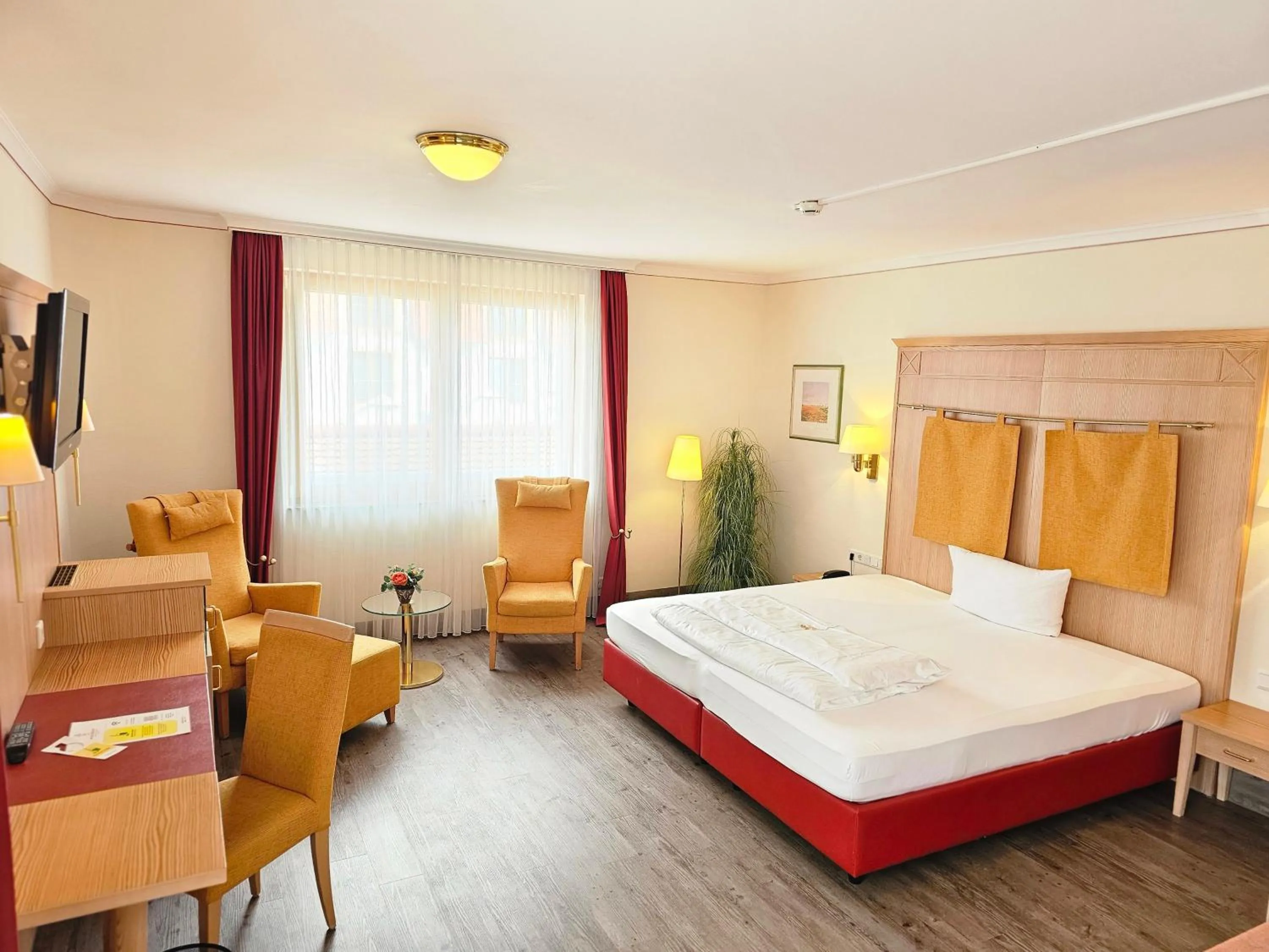 Photo of the whole room, Bed in Ringhotel Winzerhof