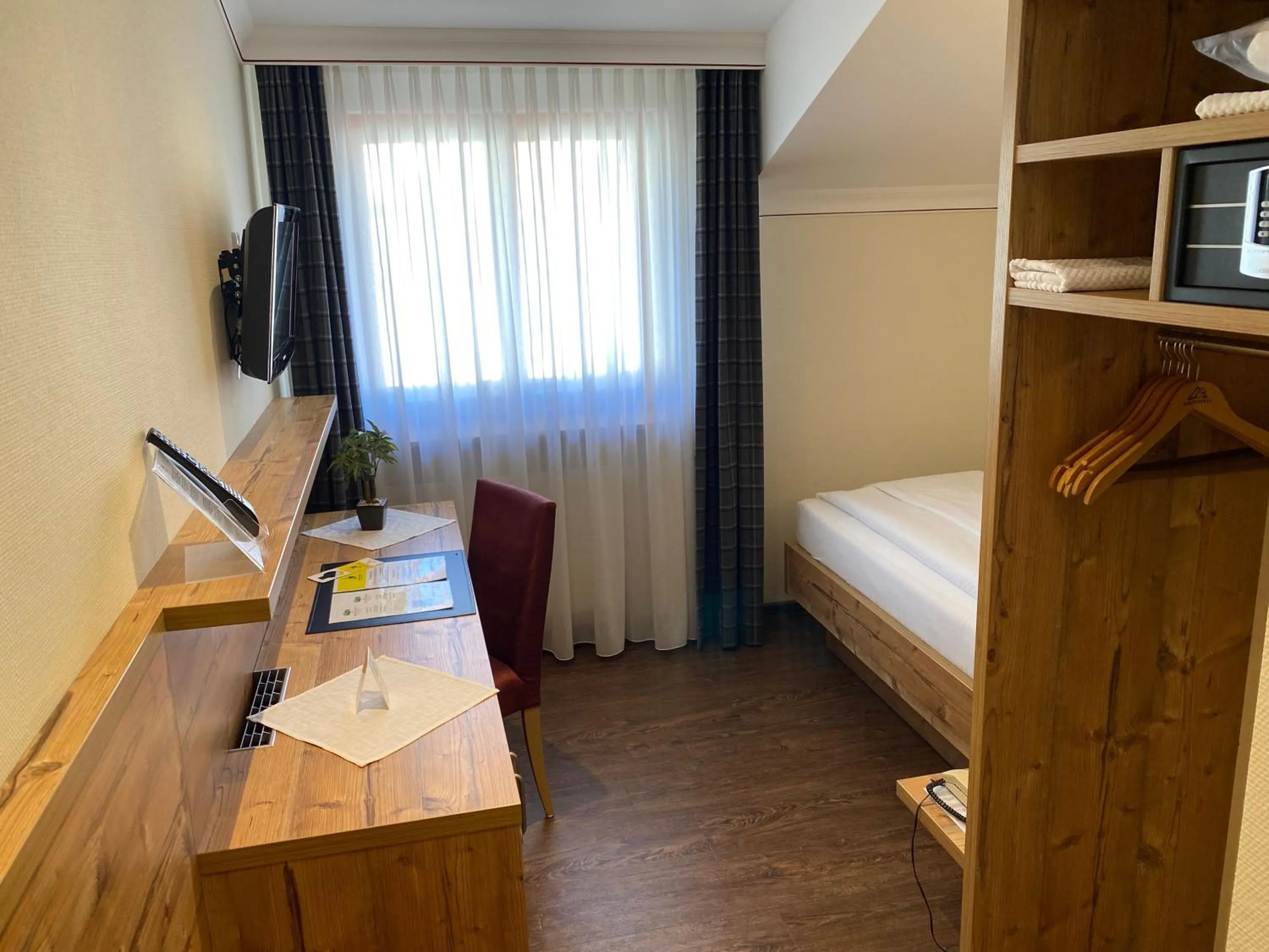 Photo of the whole room, Bed in Ringhotel Winzerhof