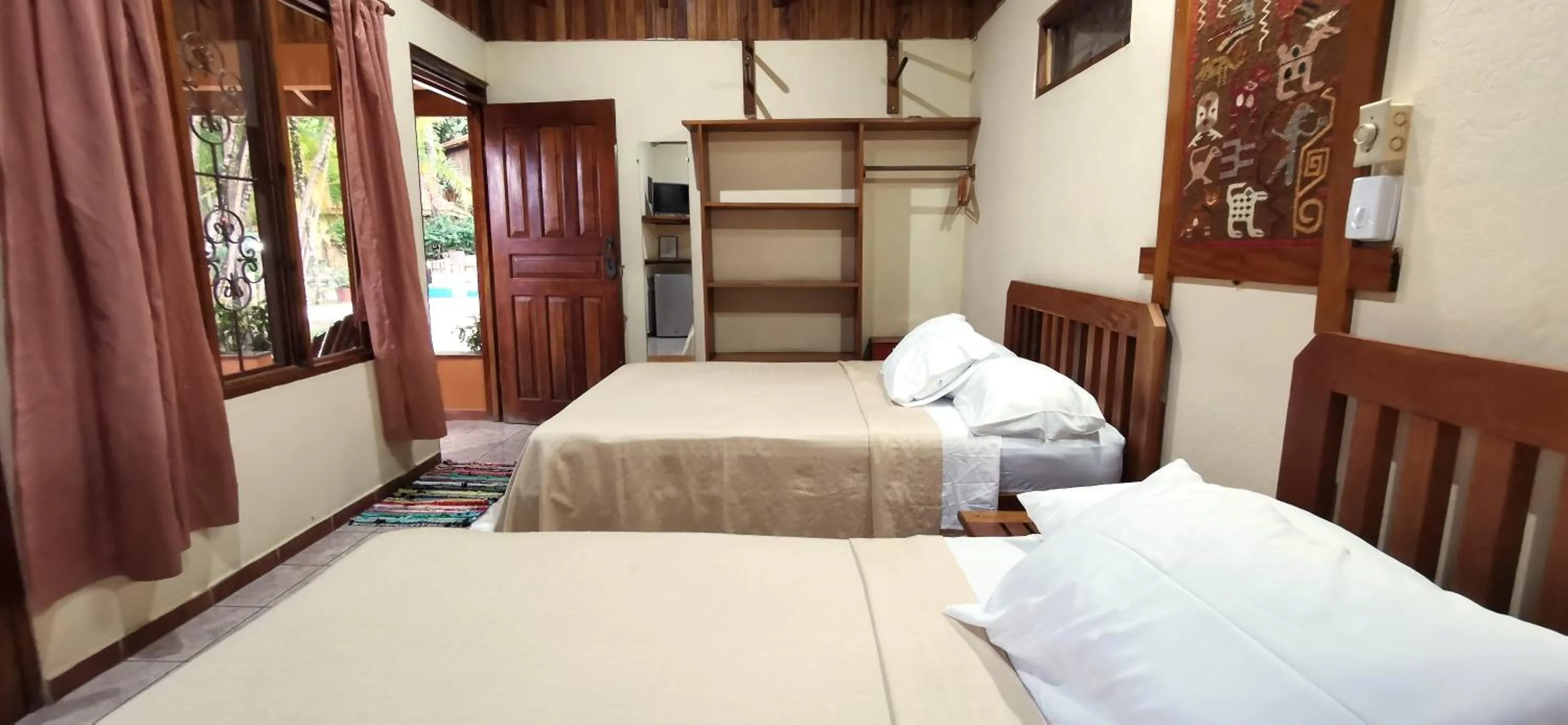 Bedroom, Bed in Hotel Ritmo Tropical - Pool and Breakfast