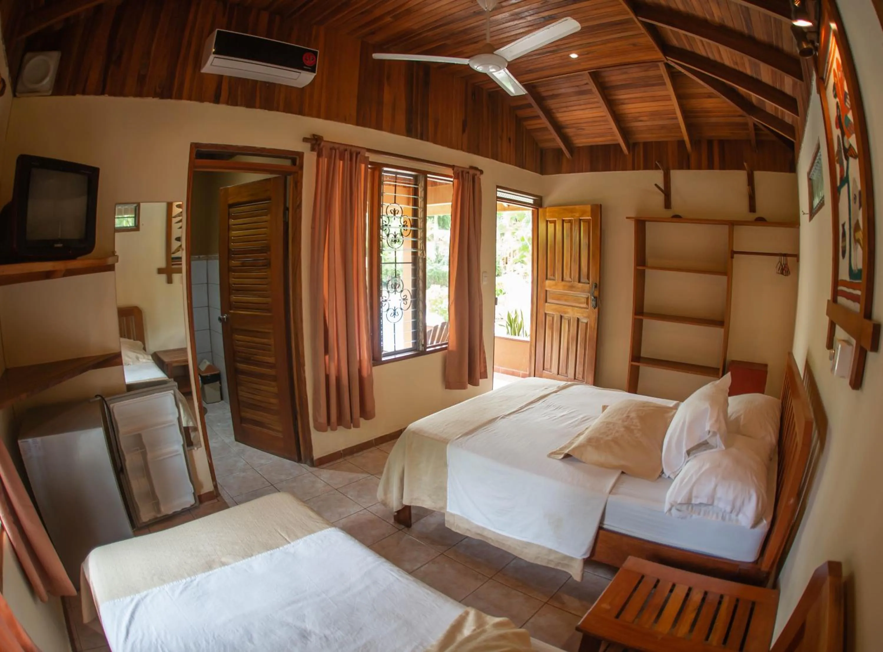 Bed in Hotel Ritmo Tropical - Pool and Breakfast