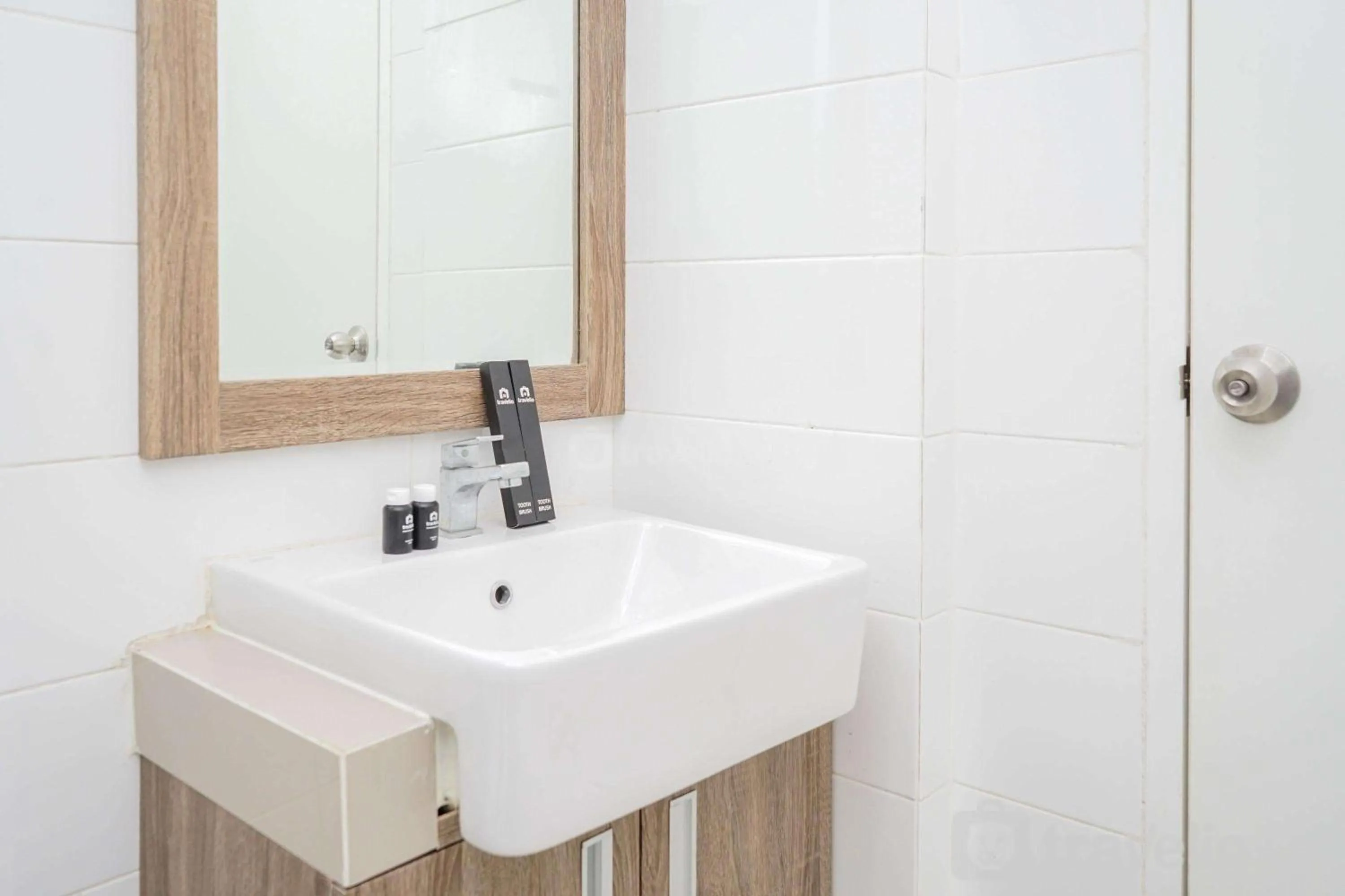 Bathroom in Cozy 2BR Apartment at Tuscany Residences With Garden View By Travelio