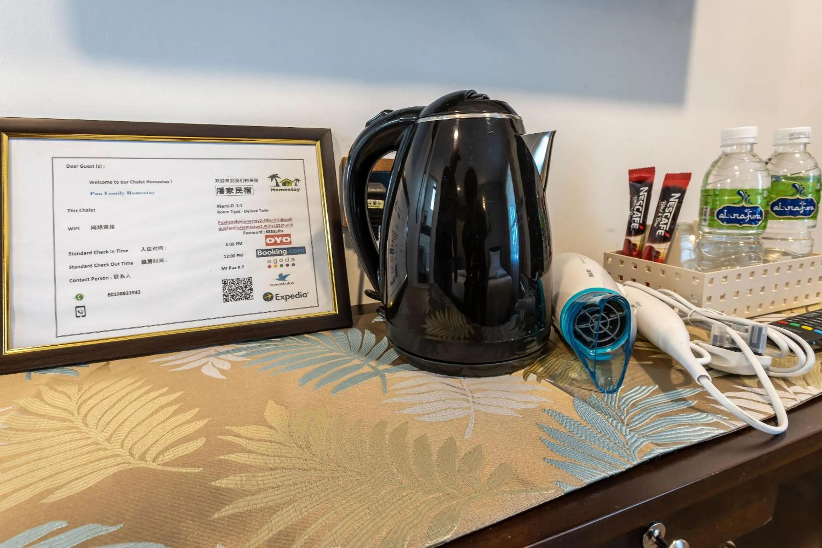 Bedroom in OYO 90149 Pua Family Semporna