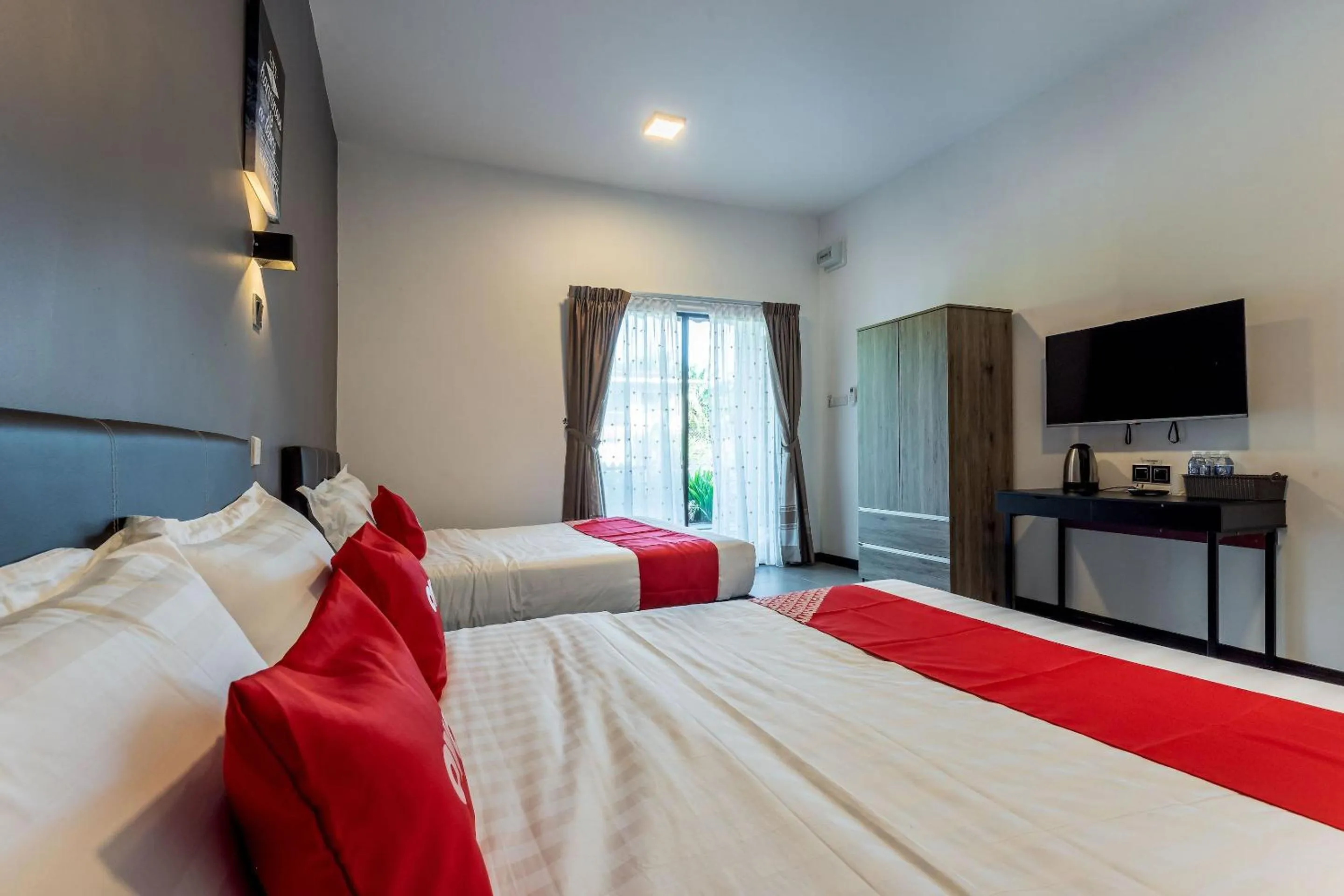 Bedroom in OYO 90149 Pua Family Semporna