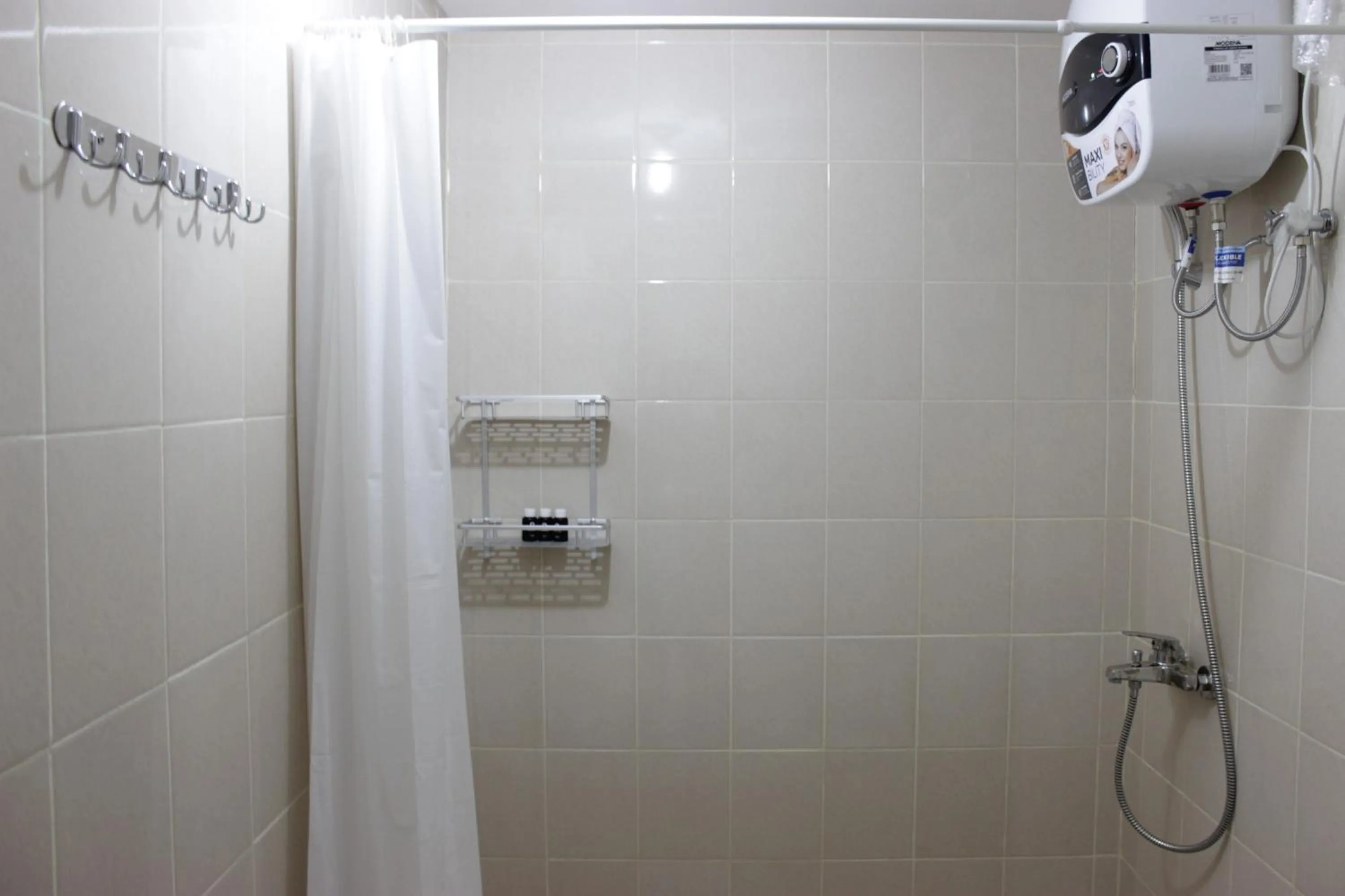 Bathroom in Spacious 3BR Apartment Parahyangan Residence near UNPAR By Travelio