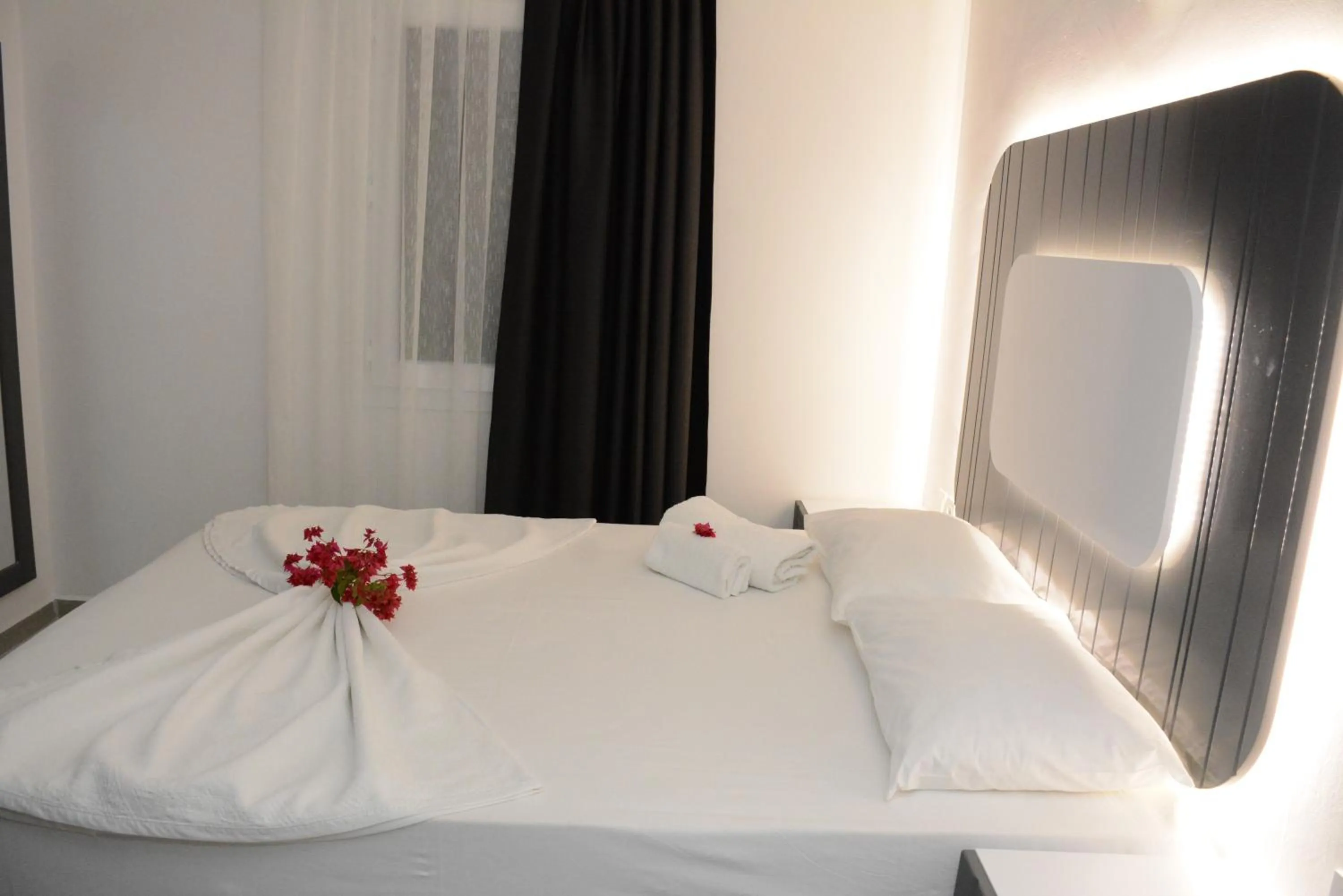 Bed in Manolya Hotel