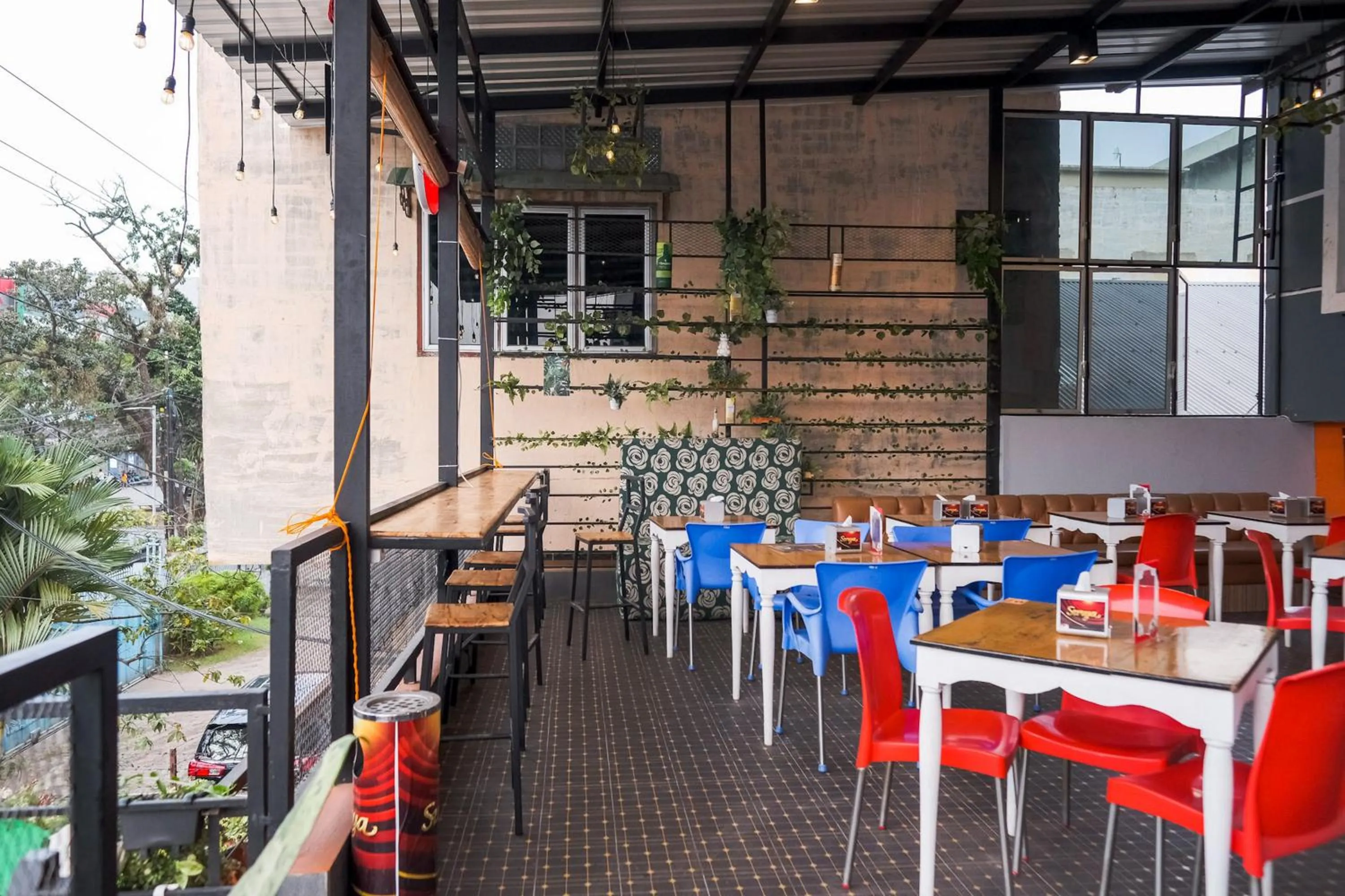 Seating area in Sans Hotel Cemara Asri Medan