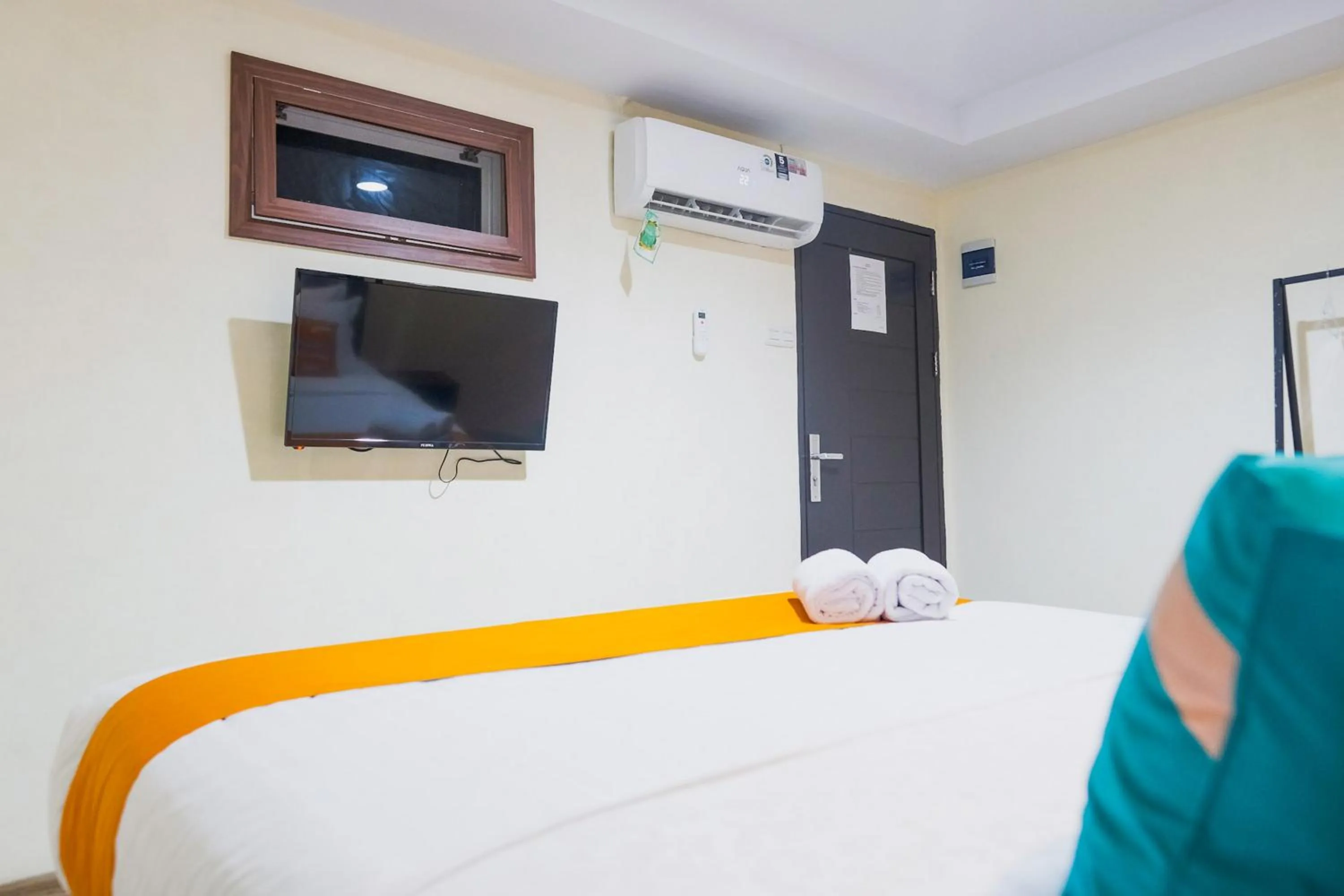 Bedroom, Bed in Sans Hotel Cemara Asri Medan