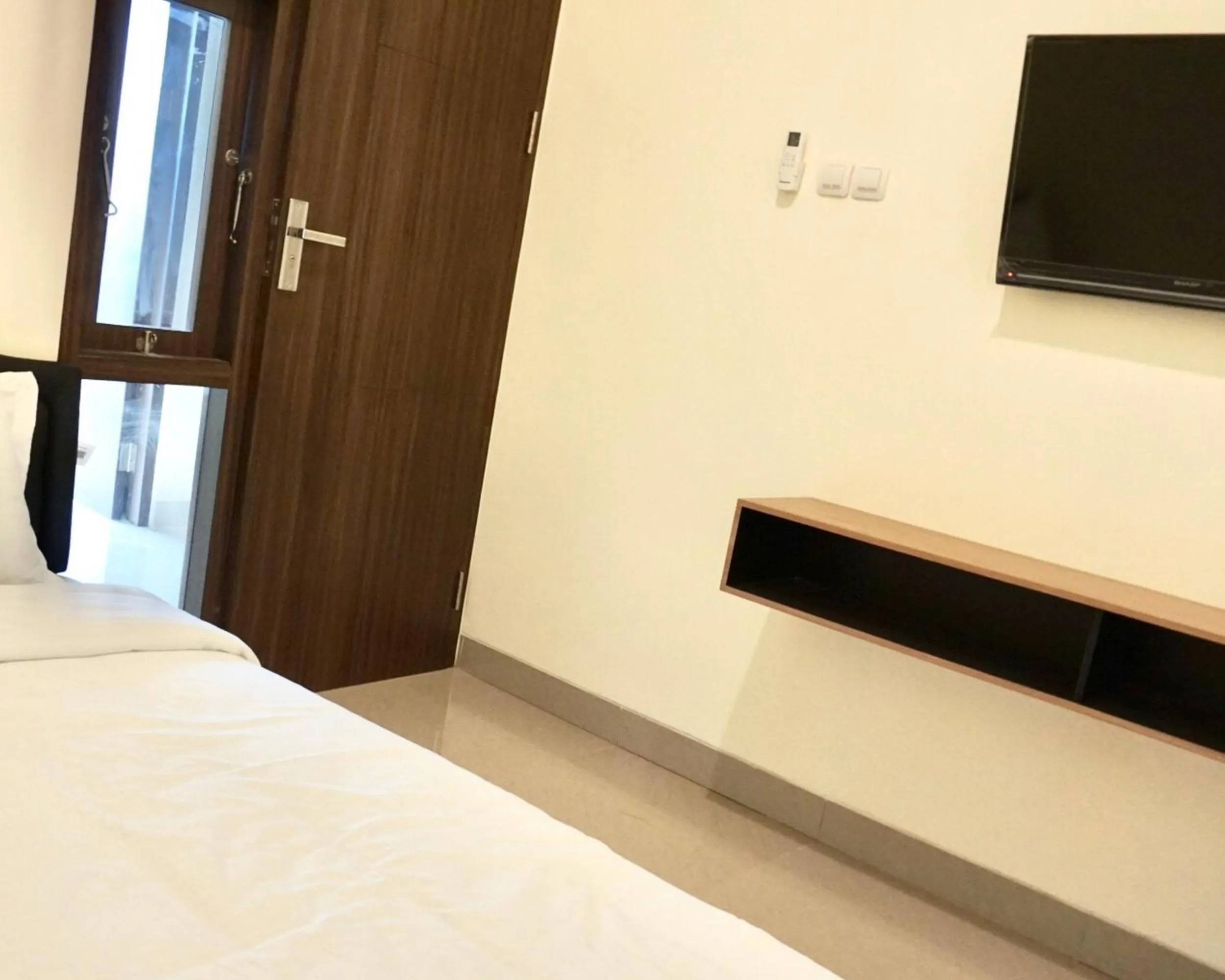 Bed in RedDoorz at Arkana Seturan Pakuwon Mall